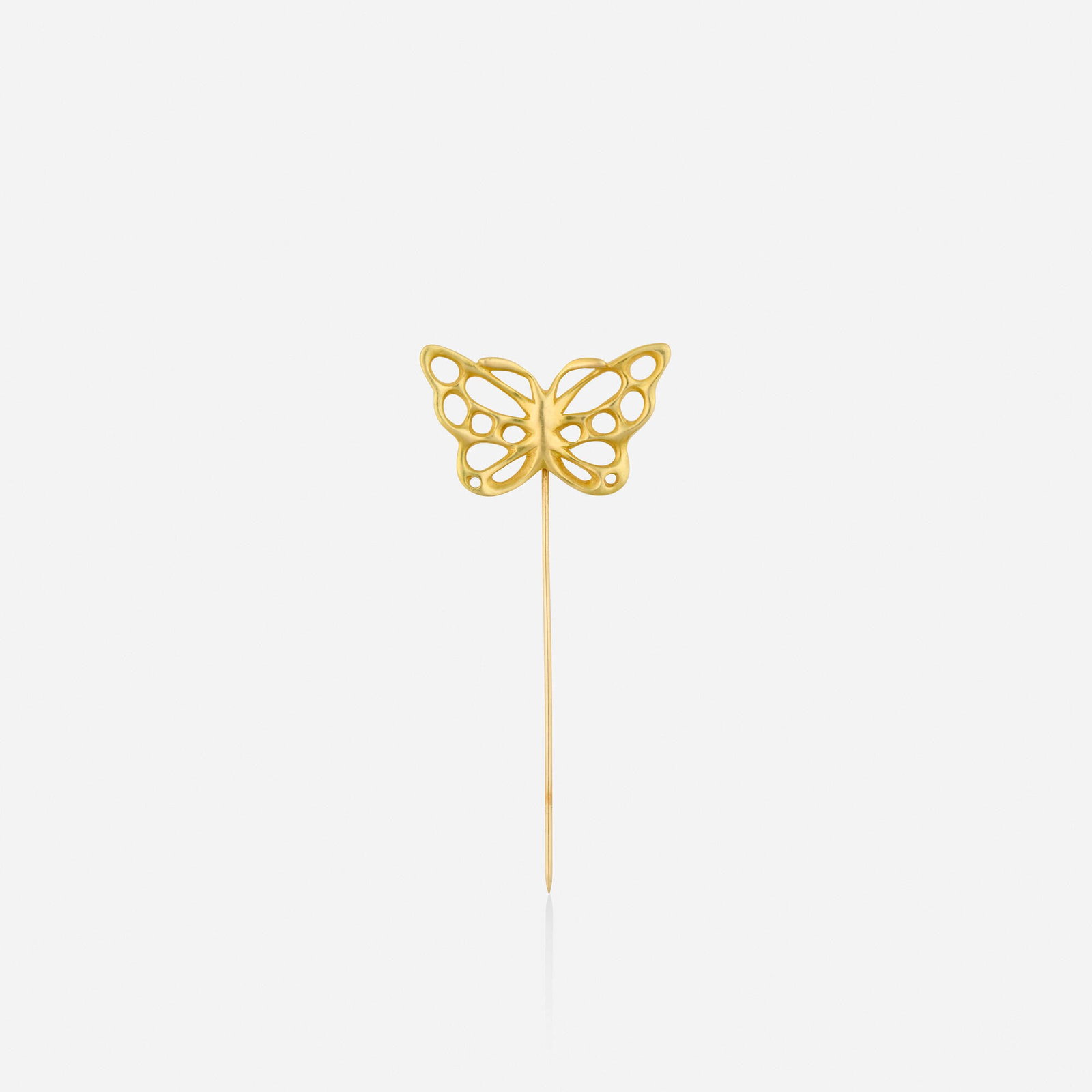 Angela Cummings for Tiffany & Co., Gold stickpin: Angela Cummings for Tiffany & Co. Gold stickpin Designed as an open form butterfly; 1982 18k yellow gold Signed Cummings T&Co. 2.25 x 1 in; Gross weight 1.8 dwts Literature: