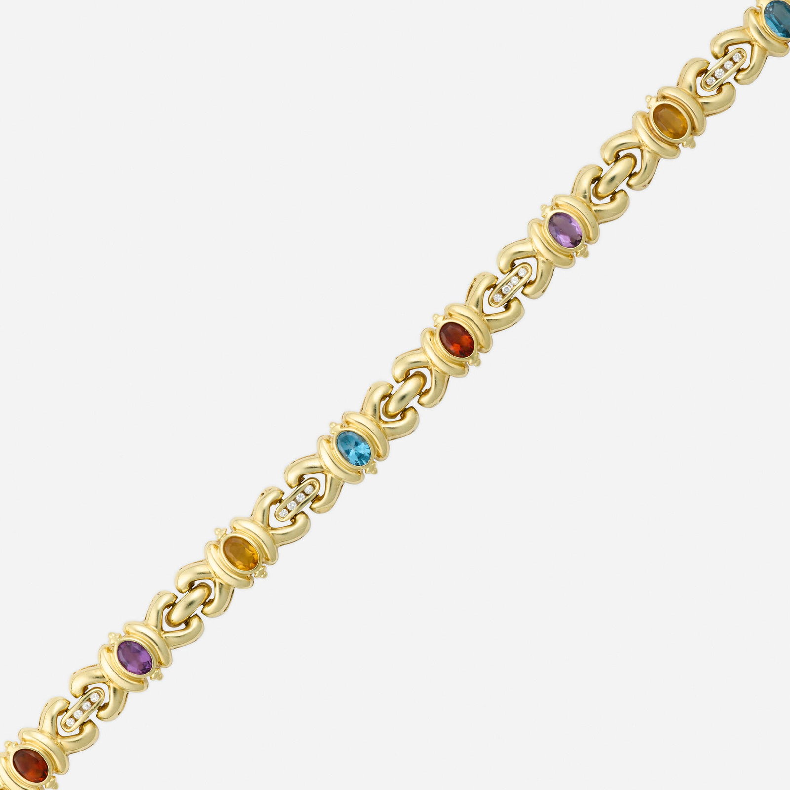 Multi-gem, diamond, and gold bracelet: Multi-gem, diamond, and gold bracelet Of fancy links, set with round brilliant-cut diamonds, oval-cut blue topaz, citrine, amethyst, and garnet 14k yellow gold 7.50 x 0.375 in; Gross weight 17.1 dwts 