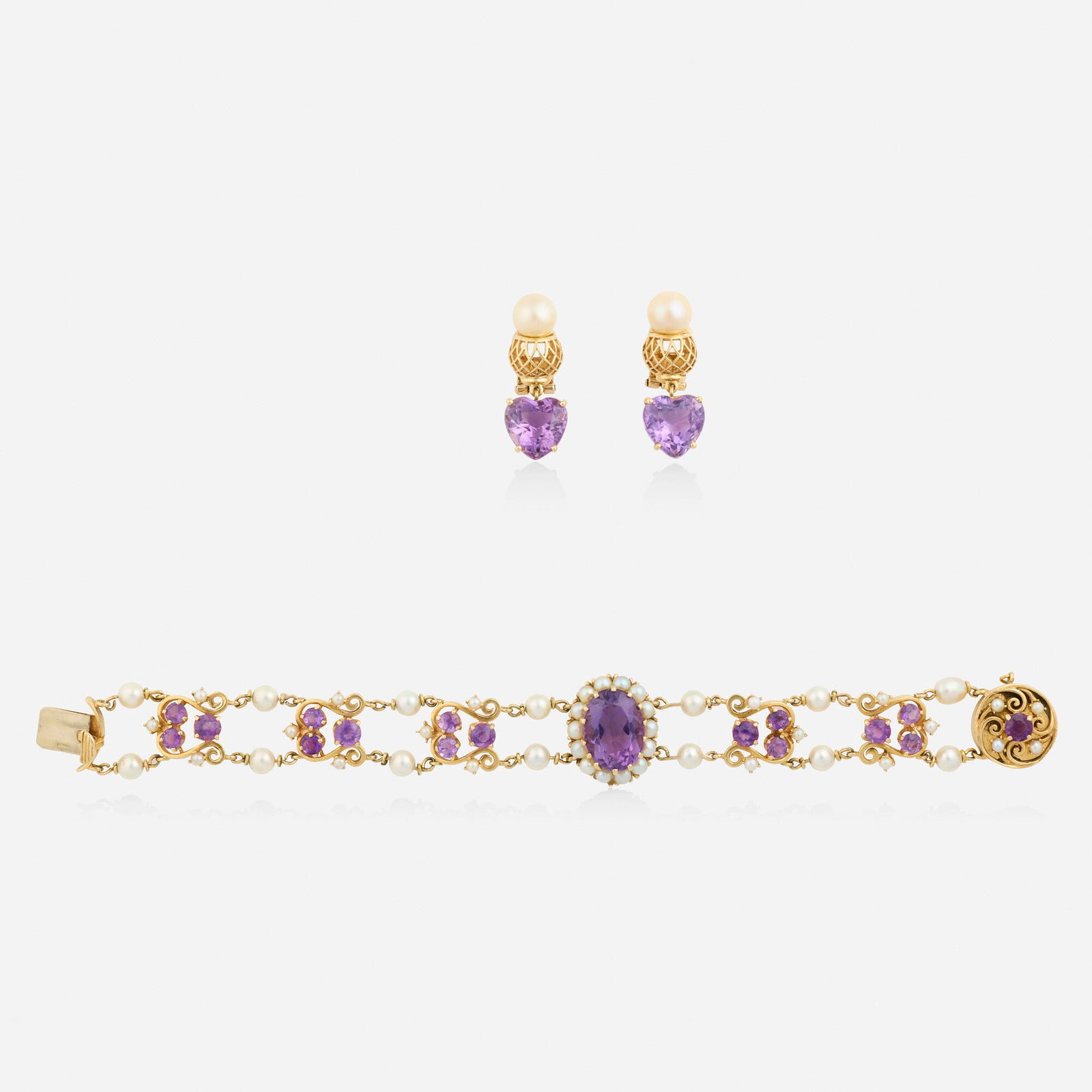 Group of amethyst, cultured pearl, and gold jewelry: Group of amethyst, cultured pearl, and gold jewelry The bracelet set with oval and circular-cut amethysts and cultured pearls; the earrings set with heart-shaped amethysts and cultured pearls 14k yell