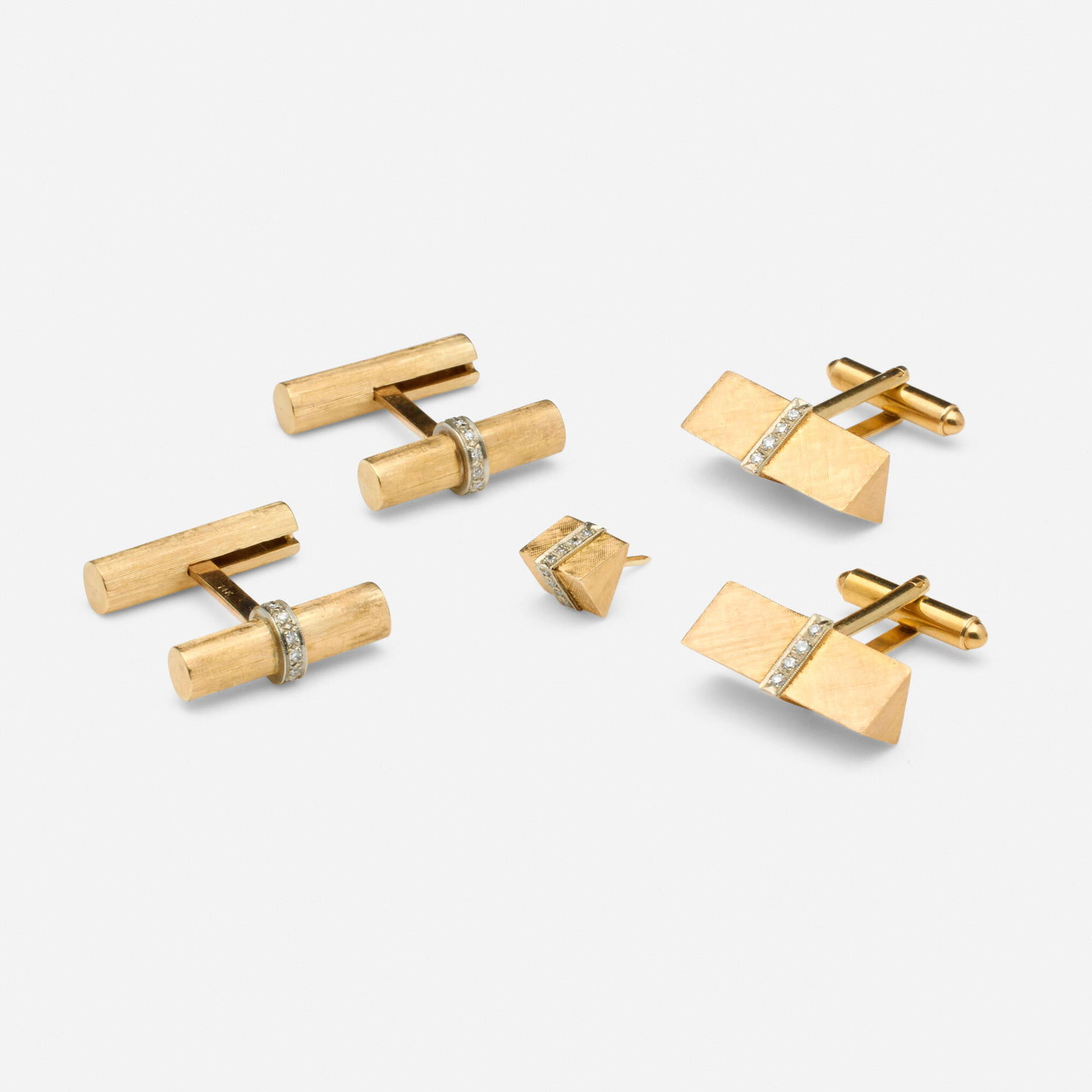 Group of diamond and gold cufflinks and tie tack: Group of diamond and gold cufflinks and tie tack Comprising two pairs of cufflinks and one tie tack, each of textured gold set with single-cut diamonds 14k yellow and white gold Cufflinks each approx.
