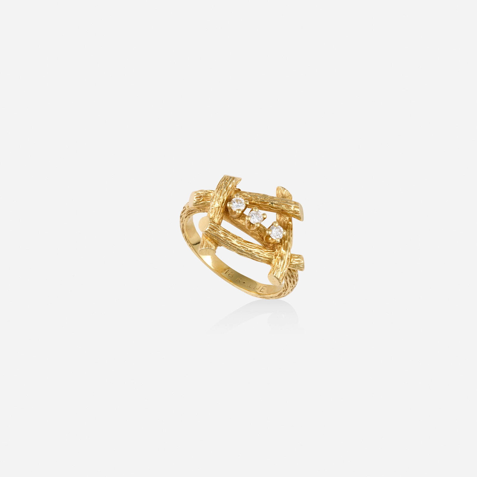 Diamond and gold ring: Diamond and gold ring Designed with overlapping tree branches and round brilliant-cut diamonds 18k yellow gold Ring size 6.75; Gross weight 3.9 dwts This work will ship from Lambertville, New Jersey.