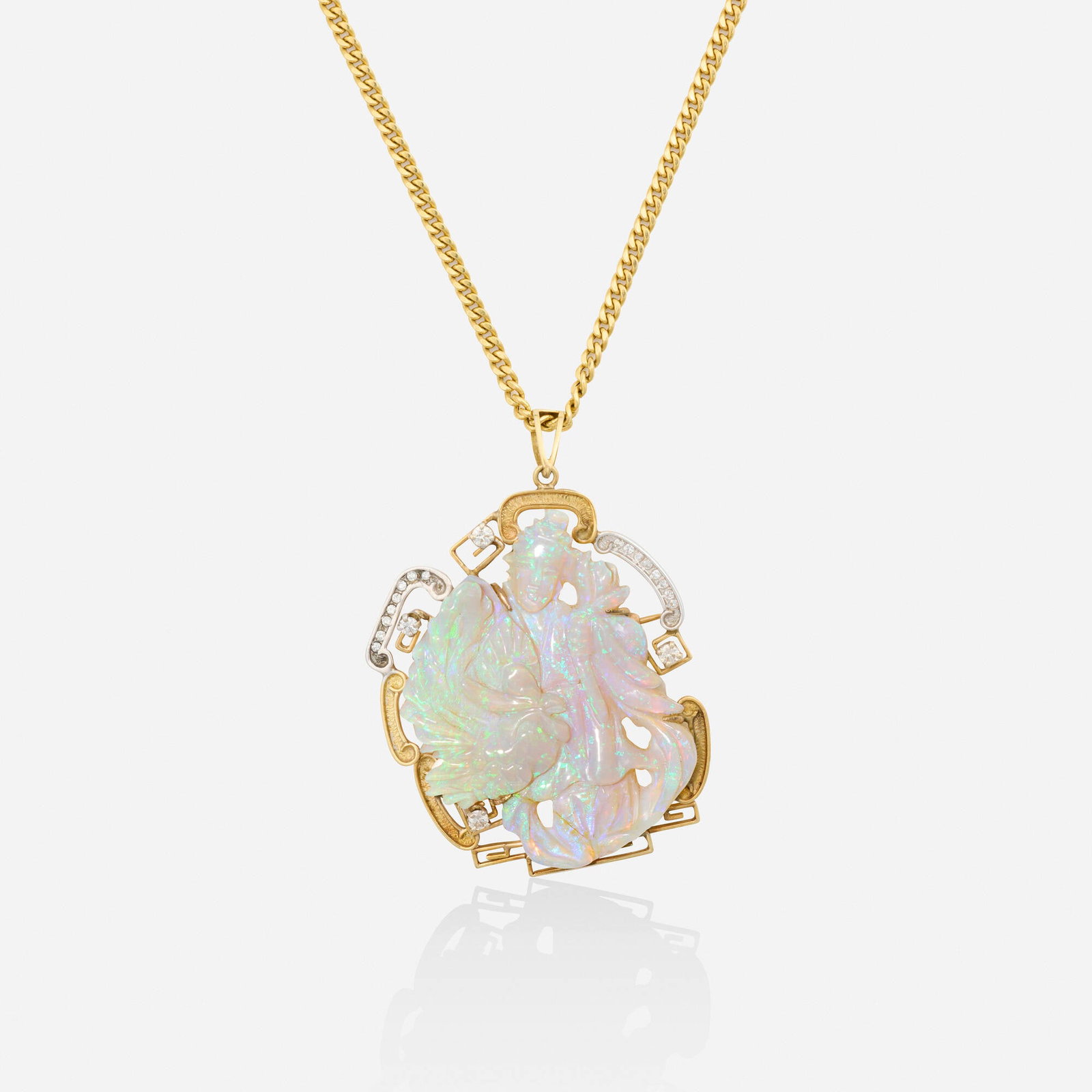 Opal, diamond, and gold necklace: Opal, diamond, and gold necklace Lori Ulanova was one of the first female violinists in the Los Angeles Philharmonic The pendant brooch set with a carved opal figure, framed by round brilliant-cut dia