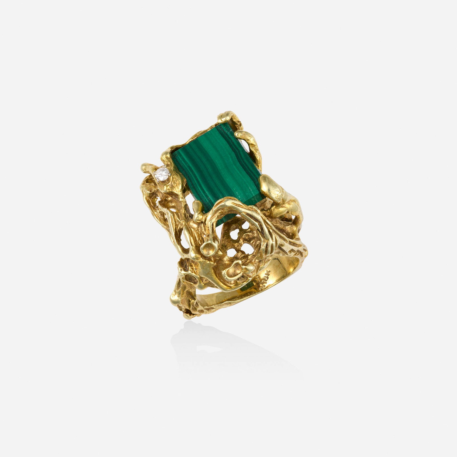 Brutalist, Malachite, diamond, and gold ring: Brutalist Malachite, diamond, and gold ring Of freeform gold, set with a rectangular plaque of malachite and round brilliant-cut diamond 14k yellow gold Ring size 9; Gross weight 14.5 dwts