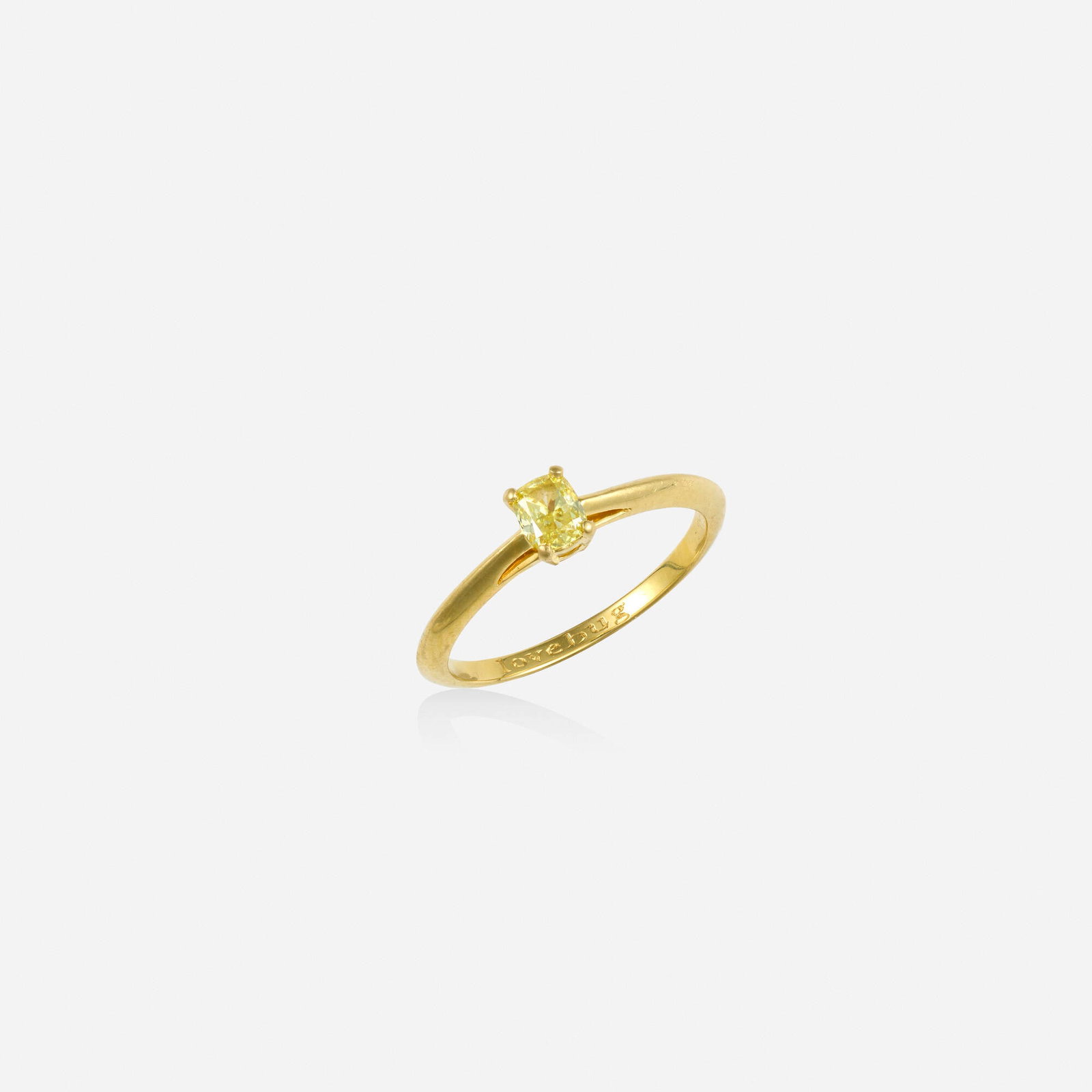 Tiffany & Co., 'Love Bug' yellow diamond and gold ring: Tiffany & Co. 'Love Bug' yellow diamond and gold ring Set with a cushion modified brilliant-cut yellow diamond 18k yellow gold Signed Tiffany & Co. Ring size 6.50; Gross weight 1.3 dwts Sold wi