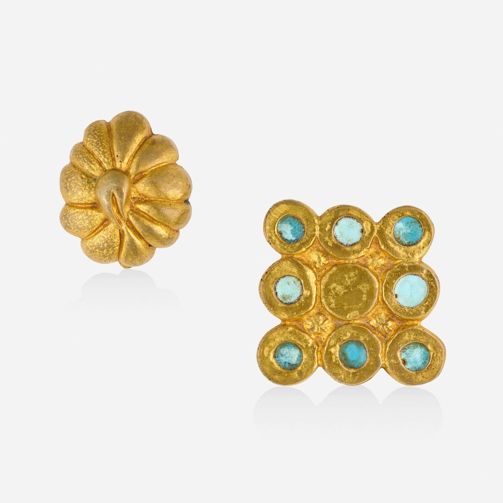 Line Vautrin, 'Corolla' clip and gilt bronze clip: Line Vautrin 'Corolla' clip and gilt bronze clip 'Corolla' clip of floral design; the other with blue enamel; 1940s Gilt bronze Signed LV to each example 1.125 x 1 in and 1.50 x 1.50 in;