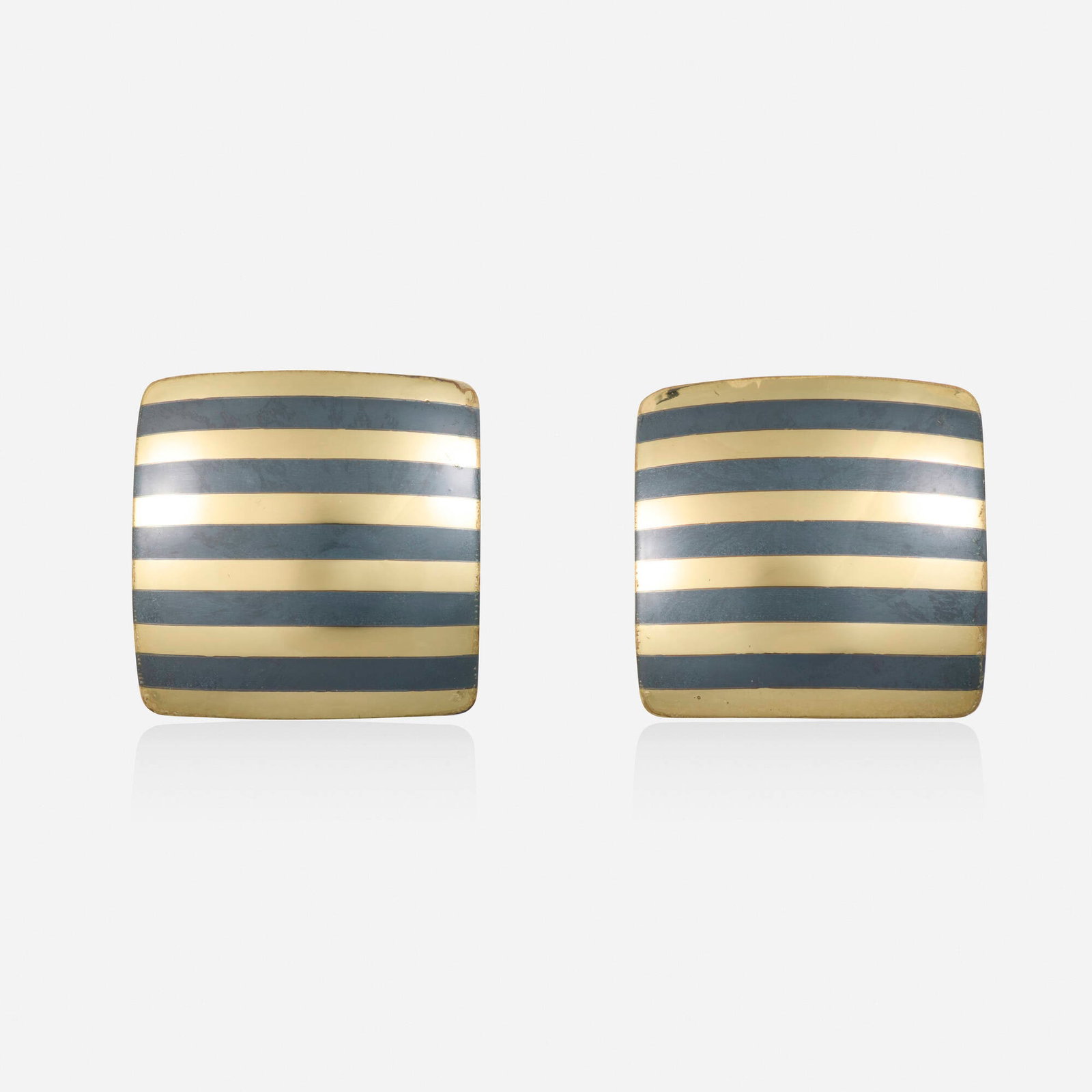 Paul Morelli, Gold and blackened silver earrings: Paul Morelli Gold and blackened silver earrings Of striped design 14k yellow gold, blackened sterling silver Signed Morelli 1 x 1 in; Gross weight 4.6 dwts This work will ship