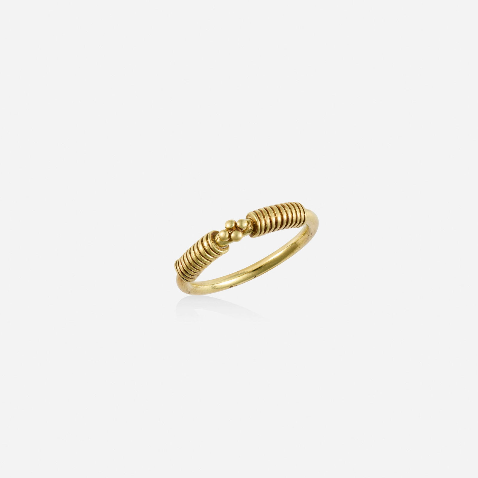 Helen Woodhull, Gold ring: Helen Woodhull Gold ring Of roped and beaded gold; 1979 18k yellow gold Signed H. Woodhull Ring size 5; Gross weight 2.5 dwts This work will ship from Lambertville, New Jersey.
