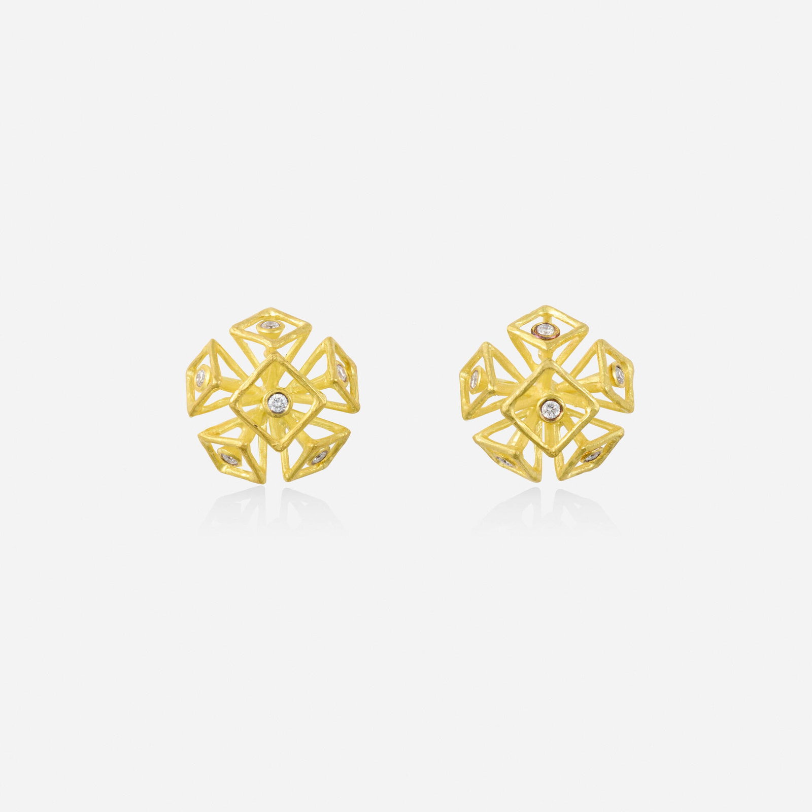 Barbara Heinrich, Diamond and gold earrings: Barbara Heinrich Diamond and gold earrings Of geometric sculptural design, set with round brilliant-cut diamonds Yellow gold 0.50 in; Gross weight 3.0 dwts Provenance: Acquired directl