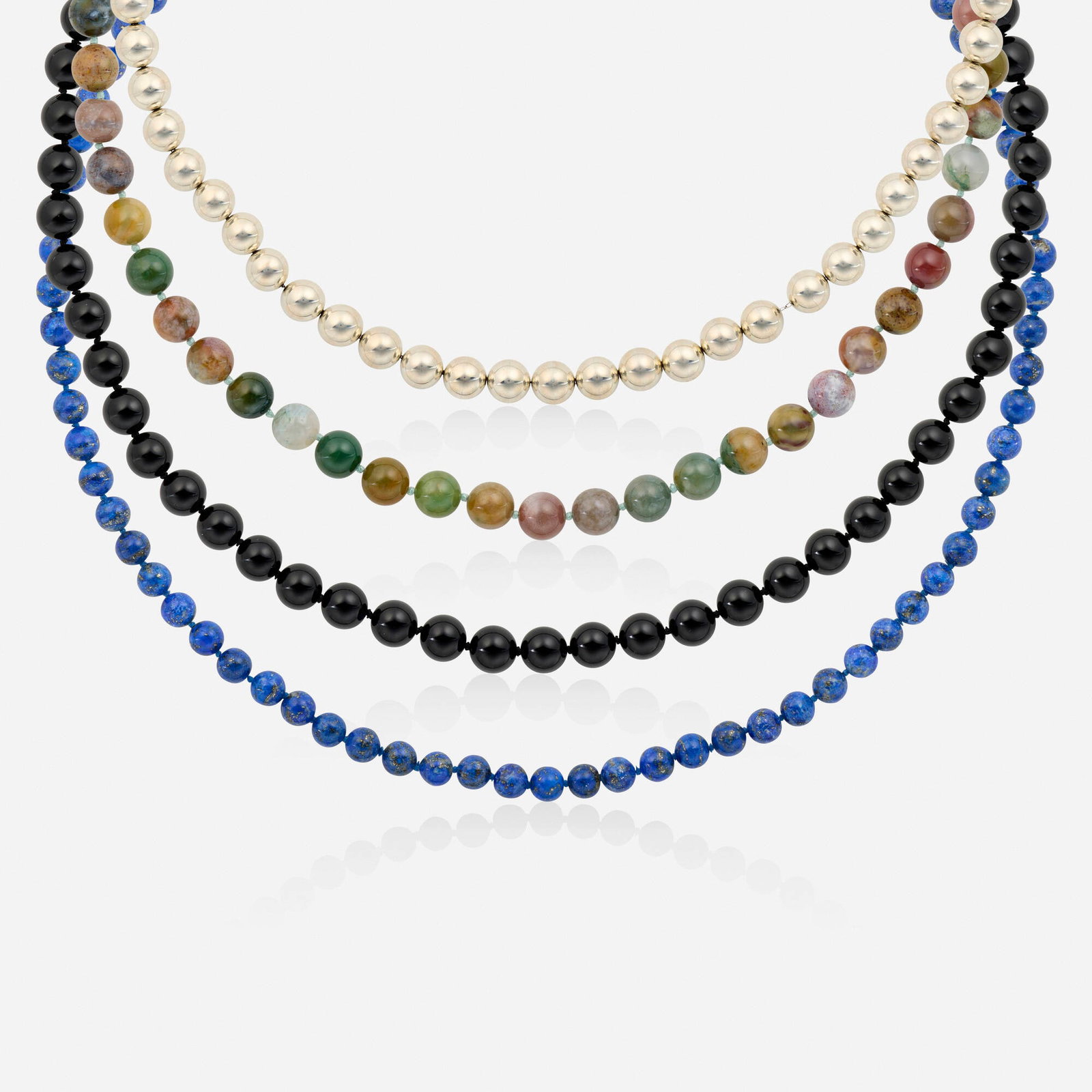 Group of bead necklaces: Group of bead necklaces One of hollow sterling silver beads; one of lapis lazuli beads; one of black onyx beads, and one of jasper beads Sterling silver, 18k and 14k yellow gold 23.50 in, 35 in, 30.50