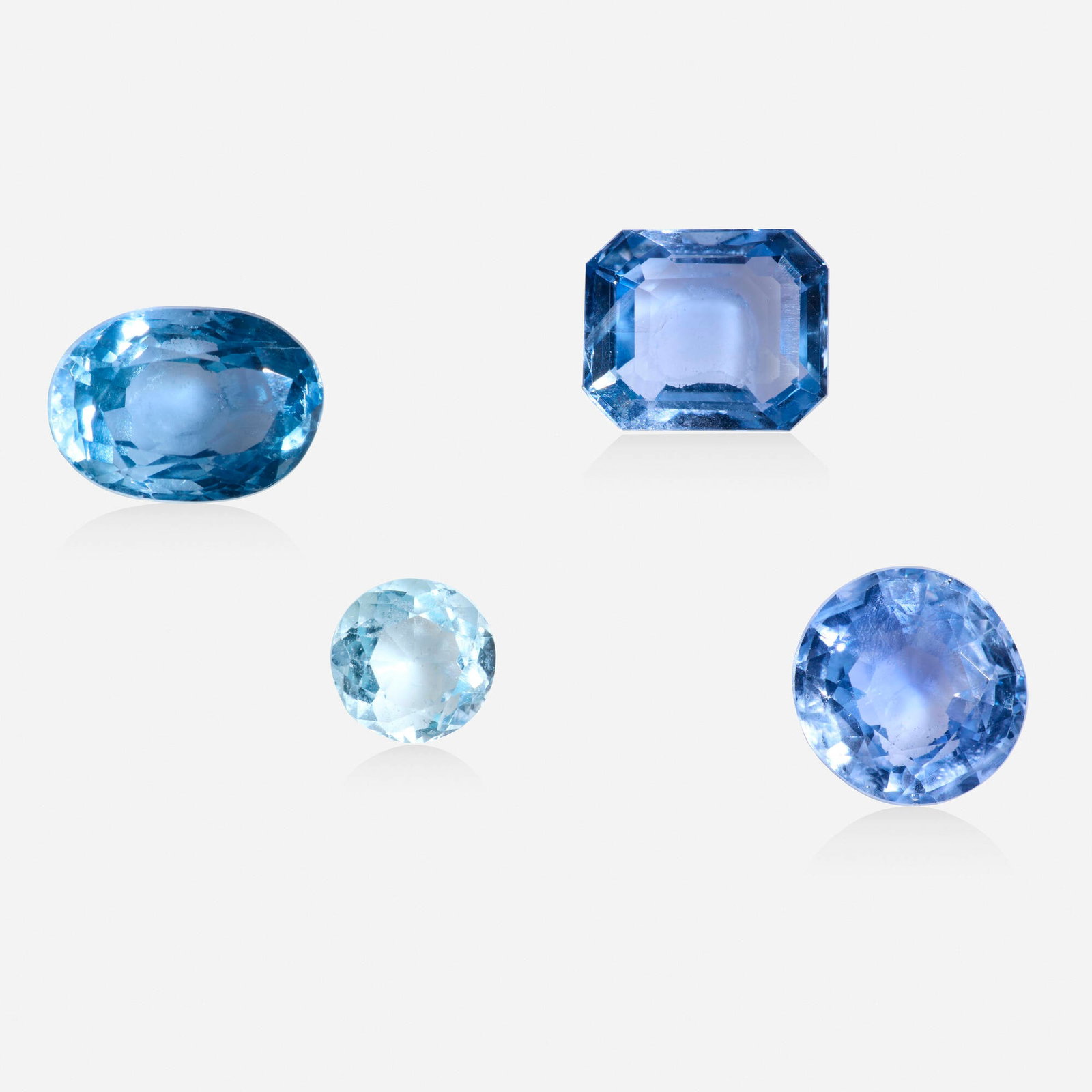 Four unmounted gemstones: Four unmounted gemstones Comprising an emerald-cut sapphire weighing approx. 3.03 cts, an oval-cut sapphire weighing approx. 3.74 cts, a circular-cut sapphire weighing approx. 3.08 cts, and a circular