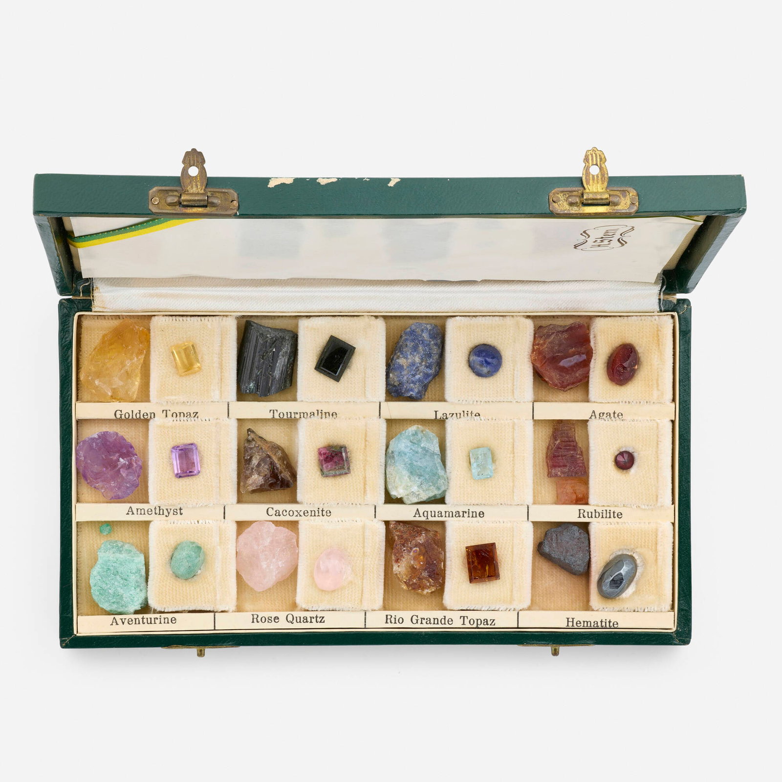 H. Stern, Gem mineral sample box: H. Stern Gem mineral sample box The box presents the gems in their natural crystalline form and as fashioned gems. It shows many of the gems that are found in Brazil. Comprising rough and faceted or c