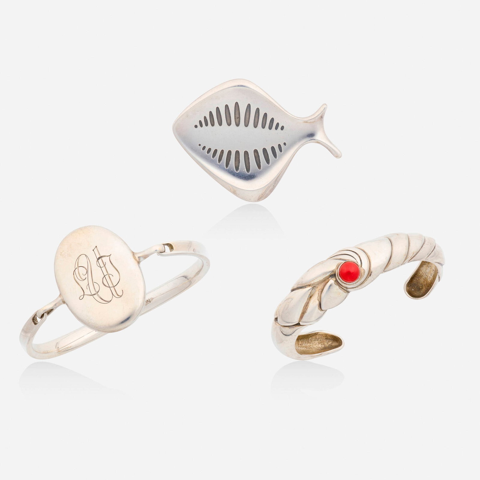 Georg Jensen, Group of sterling silver jewelry: Georg Jensen Group of sterling silver jewelry Lori Ulanova was one of the first female violinists in the Los Angeles Philharmonic Comprising a cuff bracelet set with cabochon coral designed by Ole Kor