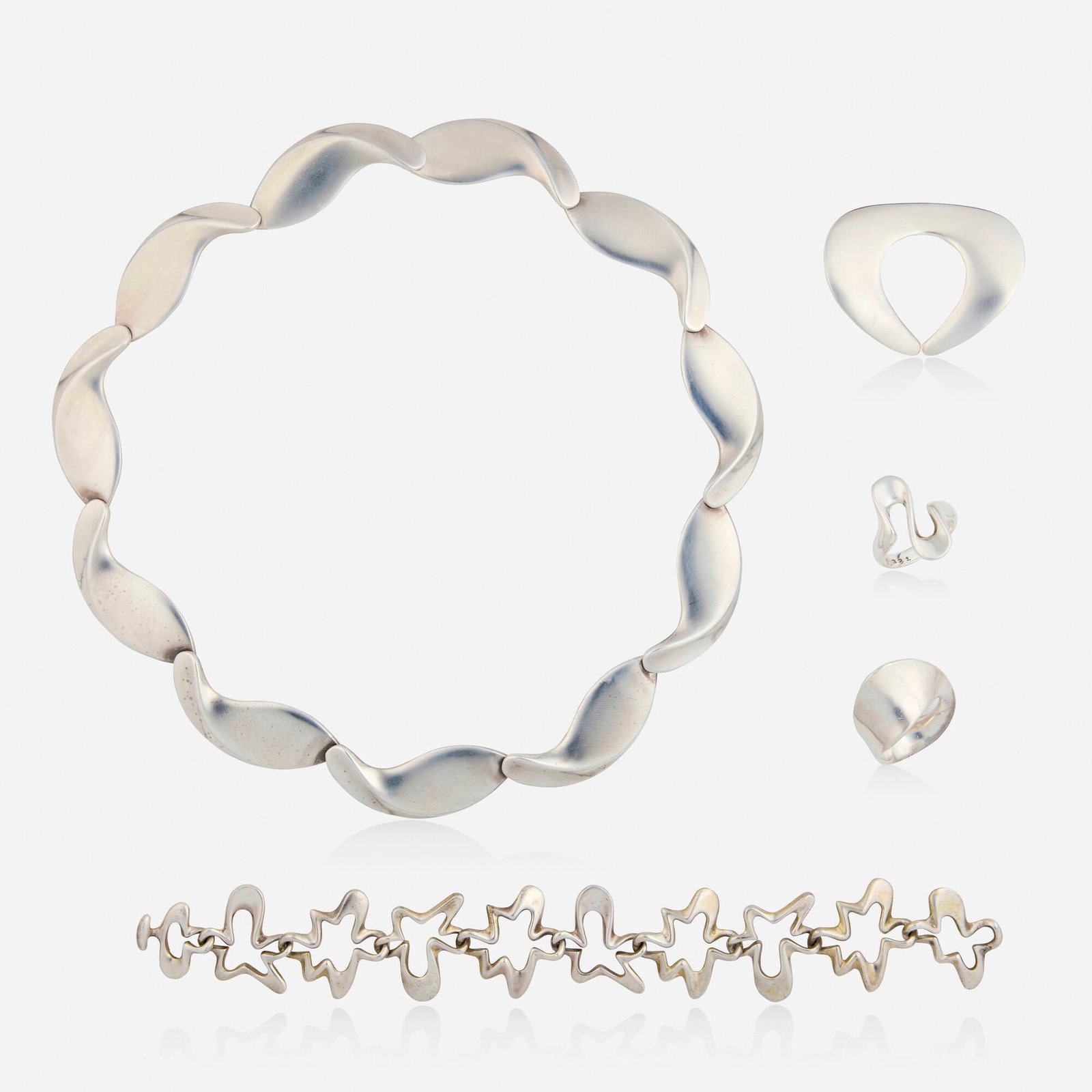 Georg Jensen, Group of sterling silver jewelry: Georg Jensen Group of sterling silver jewelry Comprising a swirl necklace, no. 13571, designed by Per Hertz/Hans Hansen; a 'splash' bracelet, no. 88B, designed by Henning Koppel; a curved br