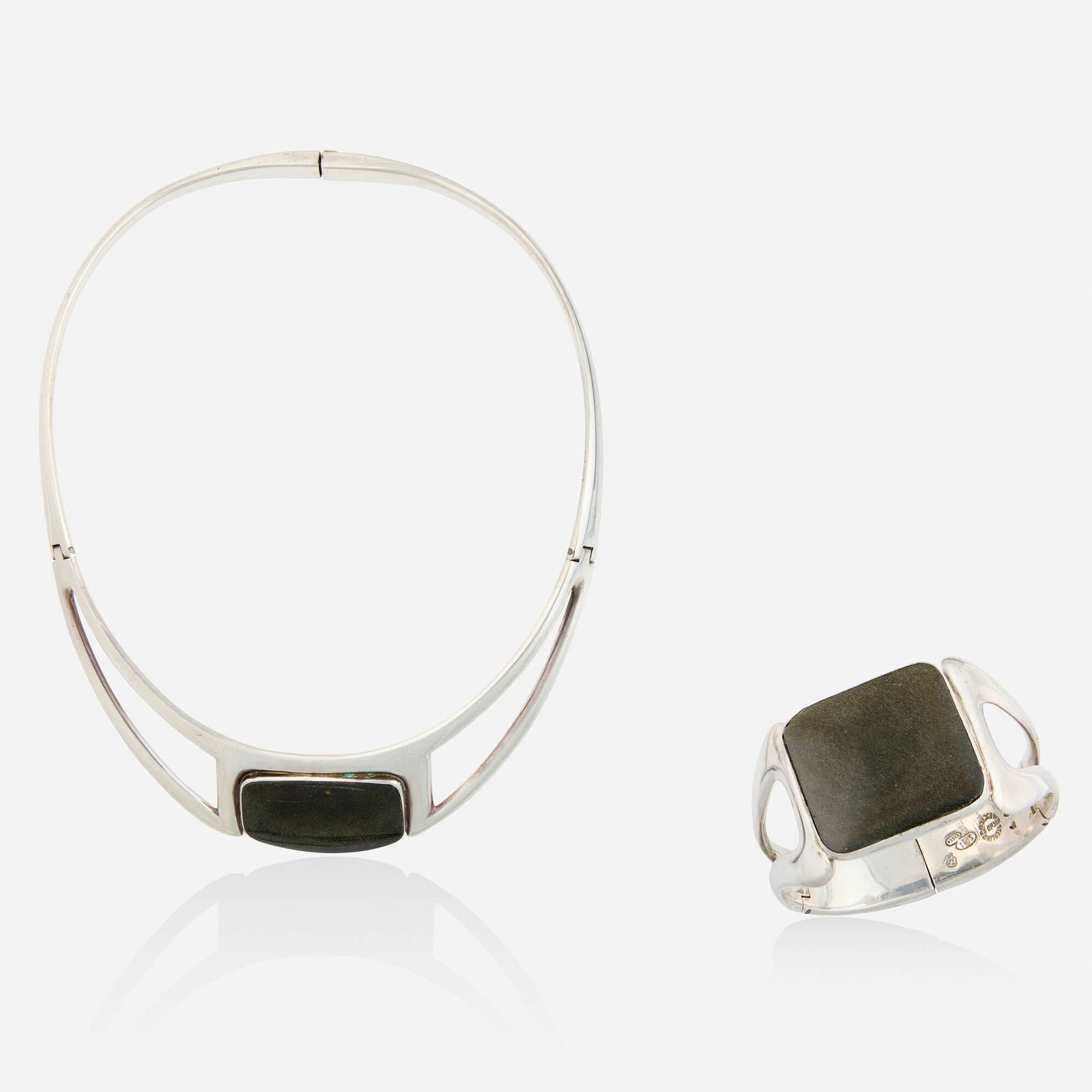 Sigfrido Pineda, Sterling silver and obsidian necklace and bracelet: Sigfrido Pineda Sterling silver and obsidian necklace and bracelet Comprising a hinged collar necklace and bangle bracelet, each set with cabochon obsidian, no. 277 Sterling silver Signed Sigi to eac