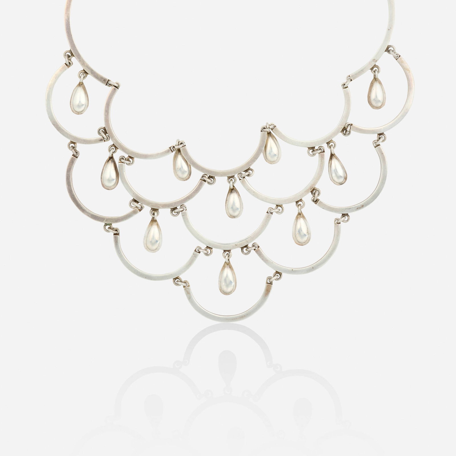 Miguel Alonzo, Sterling silver necklace: Miguel Alonzo Sterling silver necklace Of scalloped design Sterling silver Signed with maker's mark for Miguel Alonzo 14.75 in; Gross weight 55.2 dwts This work will ship