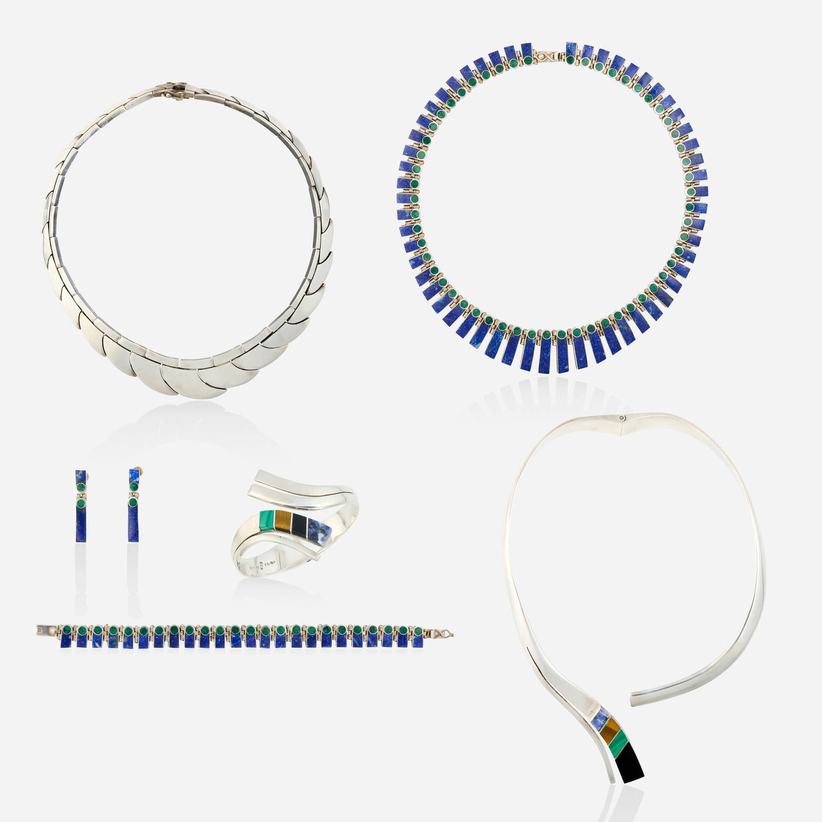 Group of multi-gem and sterling silver jewelry: Group of multi-gem and sterling silver jewelry Lori Ulanova was one of the first female violinists in the Los Angeles Philharmonic Comprising a conforming link necklace; a hinged collar necklace and b