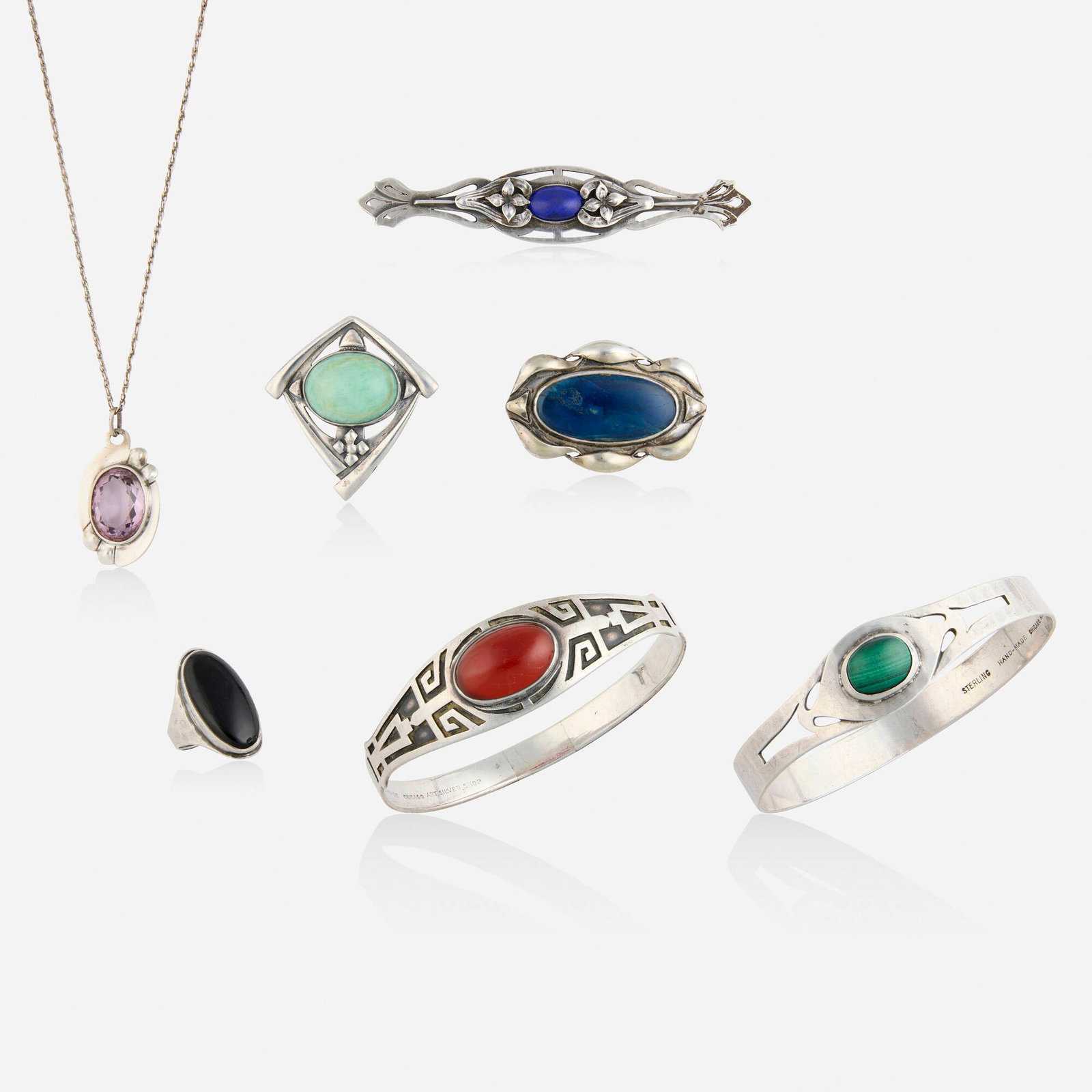 The Art Silver Shop, Group of sterling silver and multi-gem jewelry: The Art Silver Shop Group of sterling silver and multi-gem jewelry Comprising three brooches set with either cabochon lapis lazuli, amazonite, or blue hardstone, two bangle bracelets set with cabochon