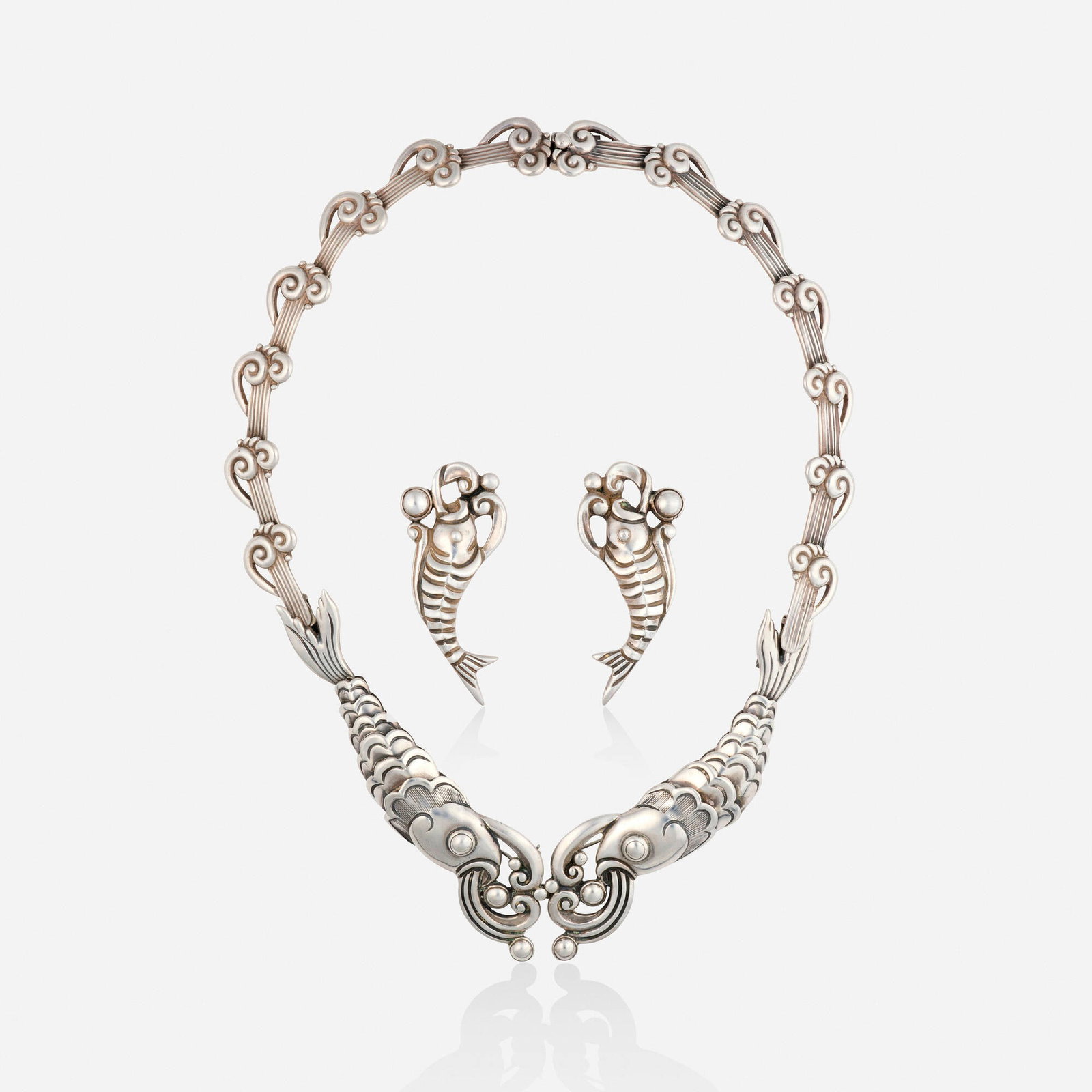 Margot Van Voorhies Carr (de Taxco), 'Double Fish' sterling silver necklace and earrings: Margot Van Voorhies Carr (de Taxco) 'Double Fish' sterling silver necklace and earrings Lori Ulanova was one of the first female violinists in the Los Angeles Philharmonic Comprising an articulated ne