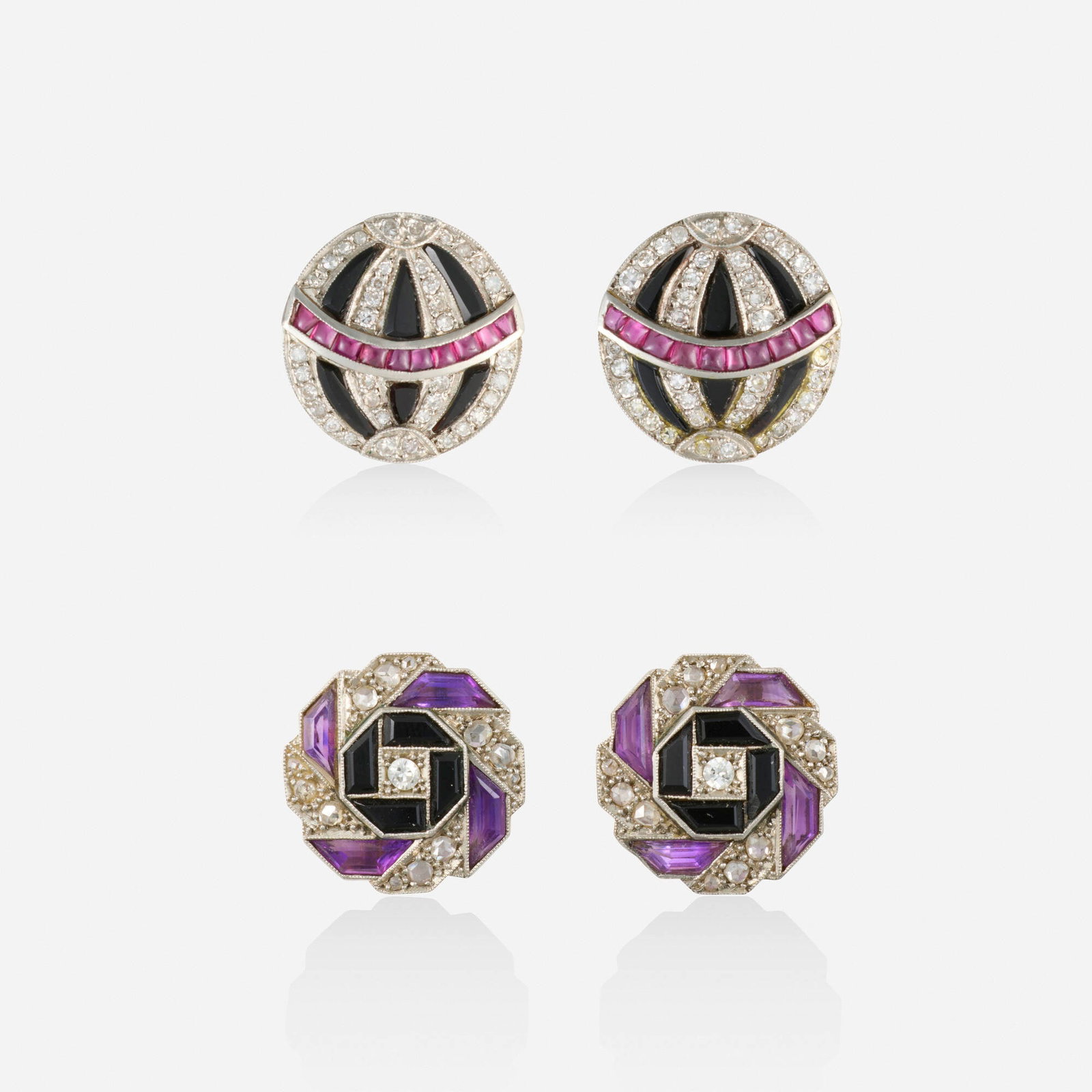 Two pairs of multi-gem and diamond earrings: Two pairs of multi-gem and diamond earrings One pair set with calibre-cut amethyst and black onyx, old European and rose-cut diamonds; the other pair set with calibre-cut black onyx, cabochon rubies, 