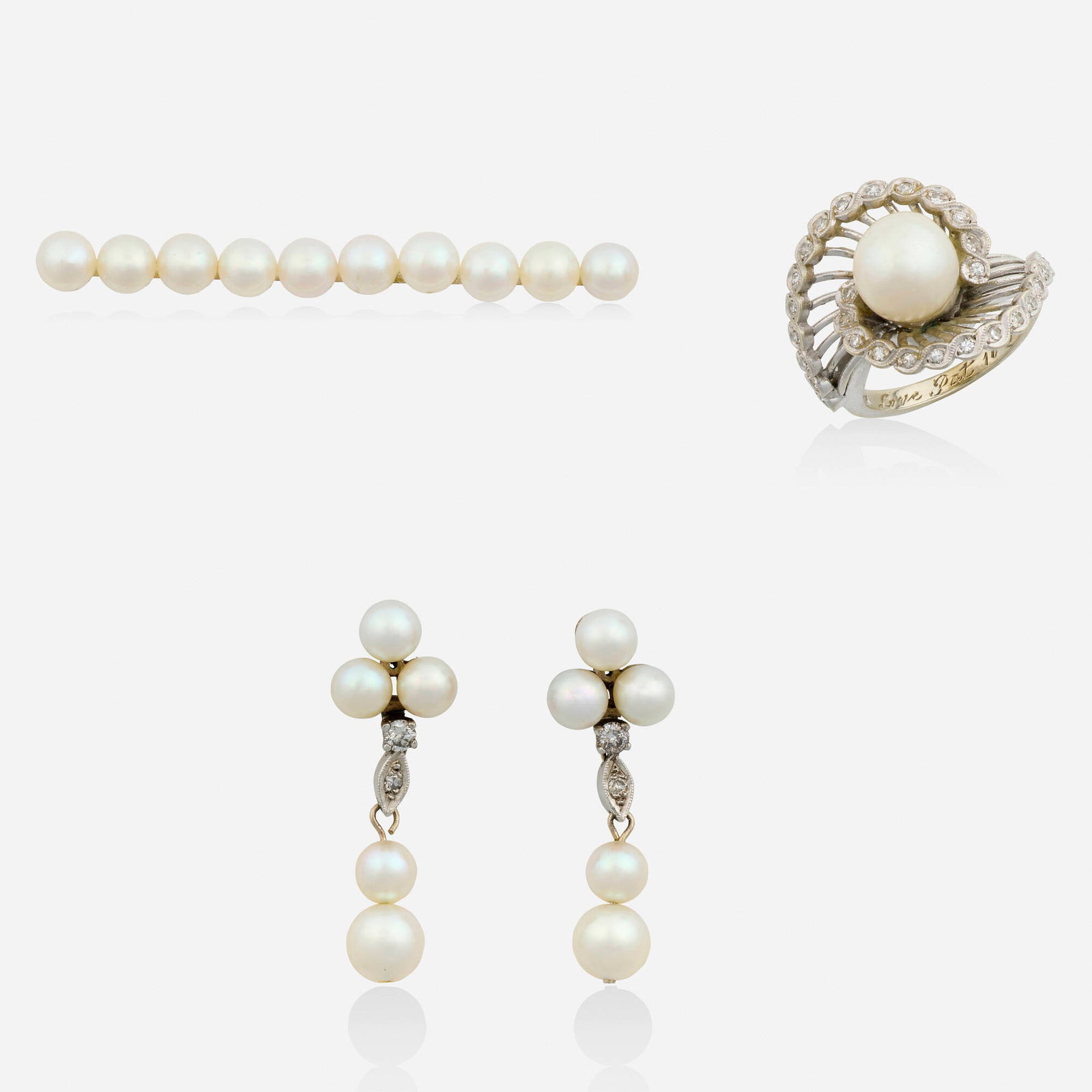 Group of cultured pearl and white gold jewelry: Group of cultured pearl and white gold jewelry Comprising a bar brooch set with cultured pearls; a ring set with a cultured pearl and single-cut diamonds, and a pair of earrings set with cultured pear