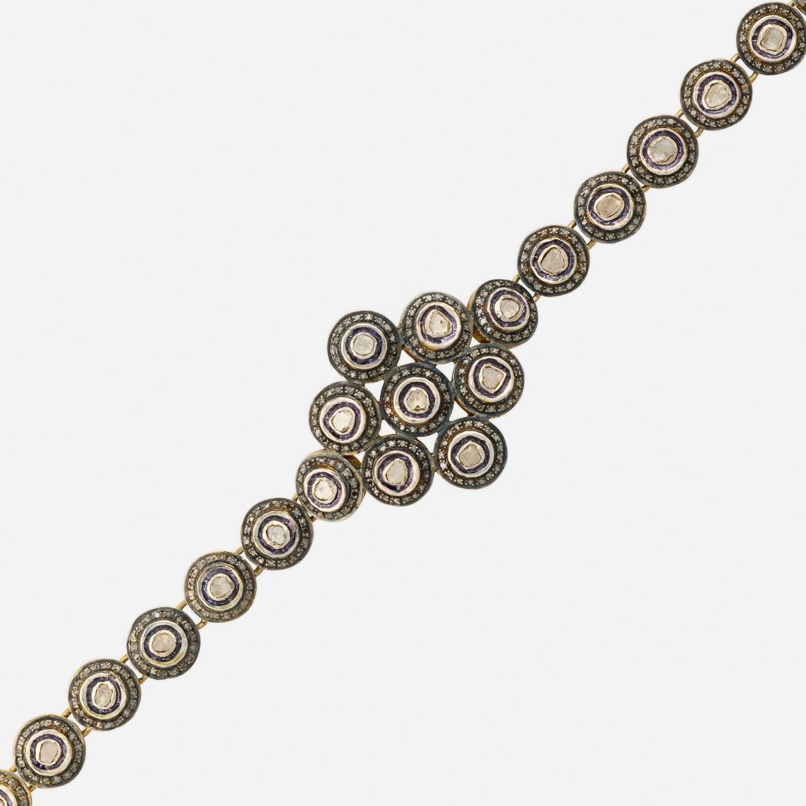 Diamond and silver gilt bracelet: Diamond and silver gilt bracelet Set with polki and rose-cut diamonds Silver gilt 7.50 x 1.25 in; Gross weight 27.4 dwts Provenance: Private New York City Collection This work will shi