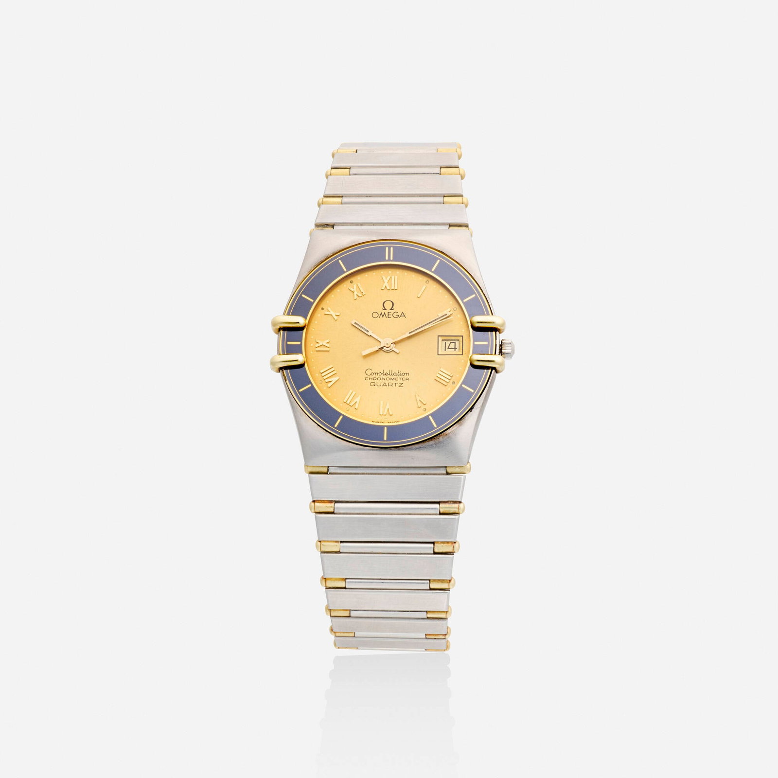 Omega, 'Constellation' stainless steel wristwatch: Omega 'Constellation' stainless steel wristwatch With Roman numeral hours and date function Dial: Gold tone Movement: Quartz Case Material: Two tone stain