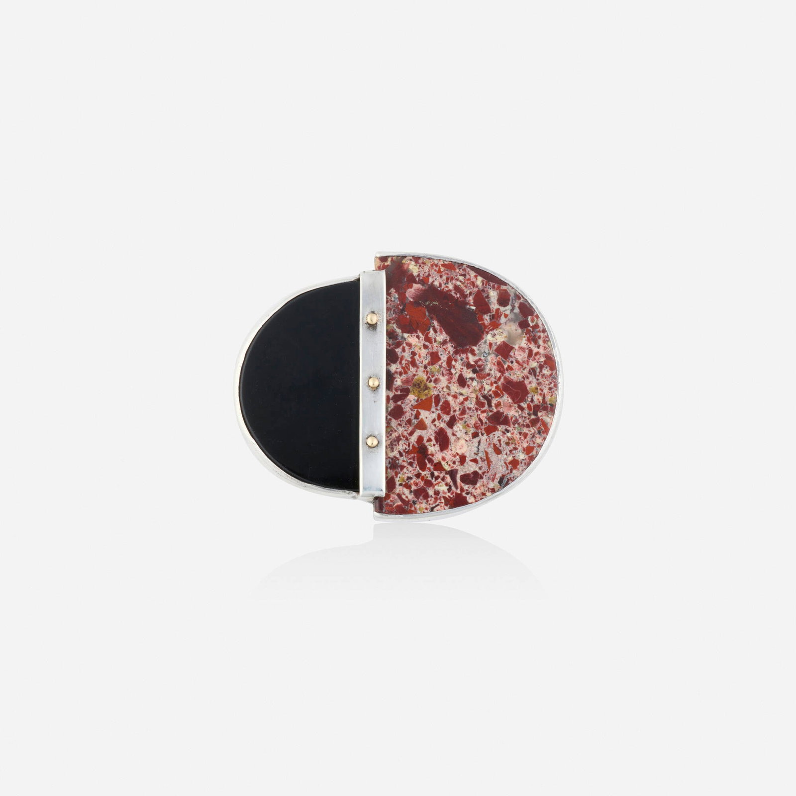 Mark Wasserbach, Multi-gem and sterling silver brooch: Mark Wasserbach Multi-gem and sterling silver brooch Set with black onyx and hardstone Sterling silver Signed with maker's mark for Mark Wasserbach 1.625 x 1.375 in; Gross weight 11.6 dwts