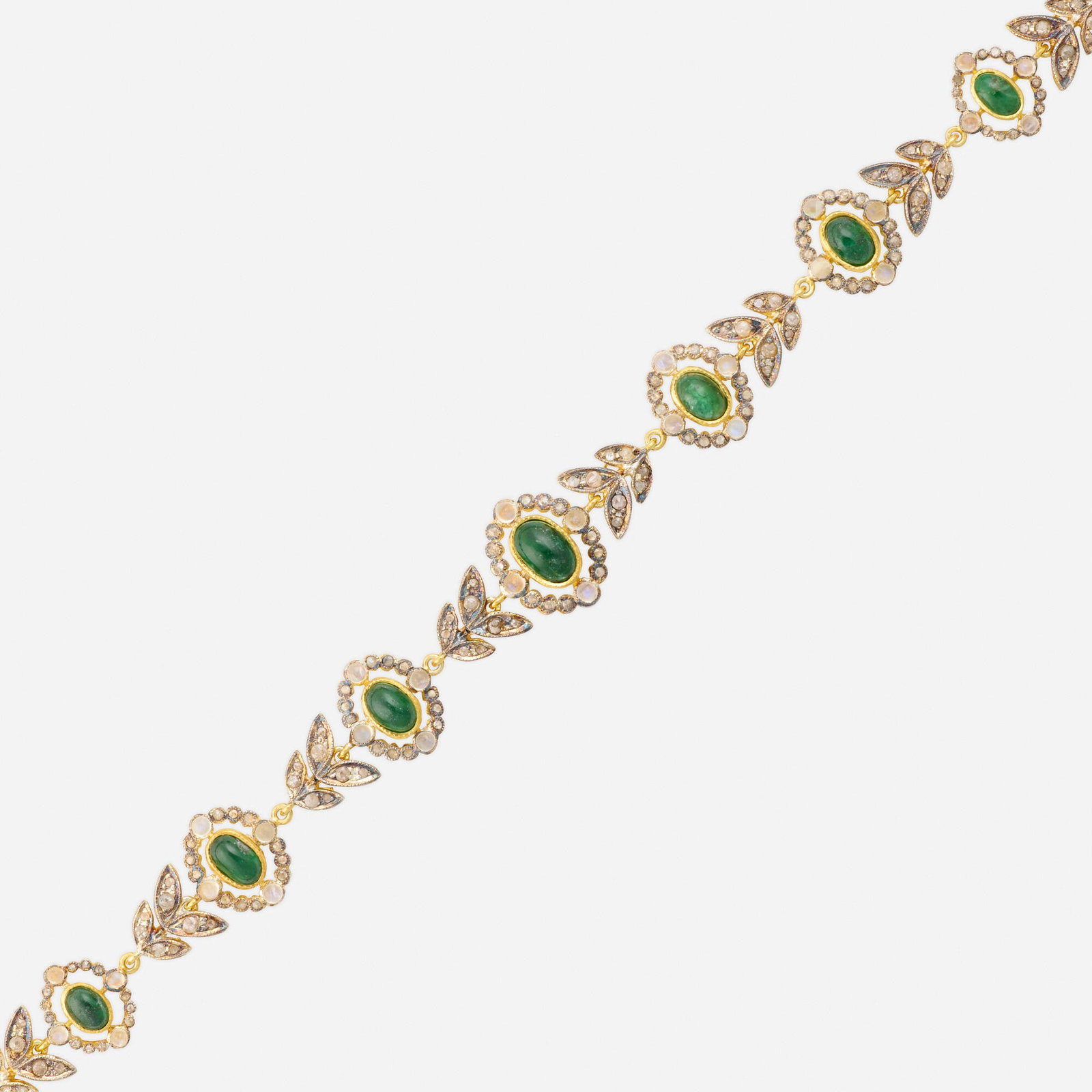 Multi-gem, diamond, and silver gilt bracelet: Multi-gem, diamond, and silver gilt bracelet Set with rose-cut diamonds, cabochon emeralds and moonstones Sterling silver gilt, 14k yellow gold 7 x 0.50 in; Gross weight 7.5 dwts This work will ship f