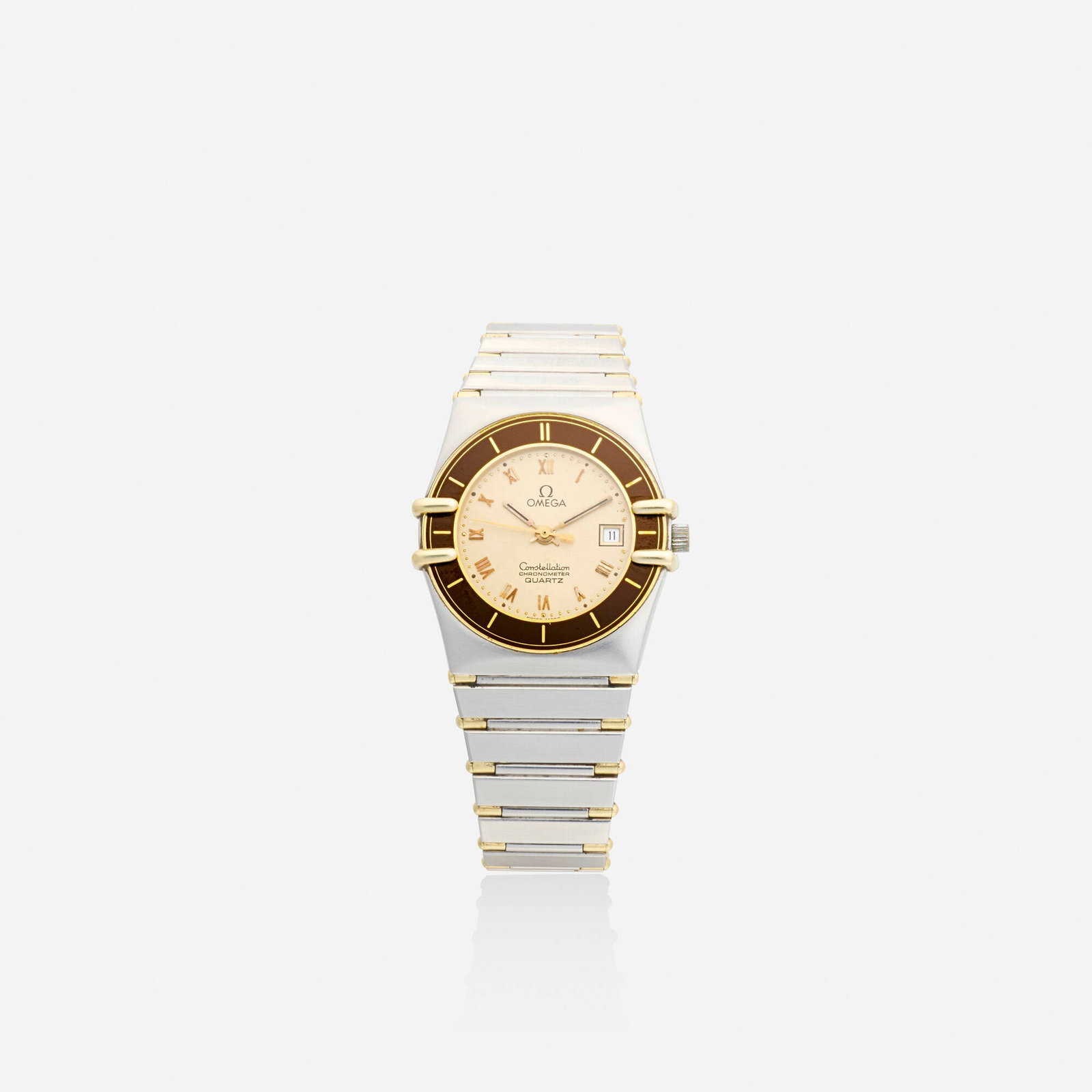 Omega, 'Constellation' stainless steel wristwatch: Omega 'Constellation' stainless steel wristwatch With Roman numeral hours and date function Dial: Gold tone Movement: Quartz Case Material: Two tone stain