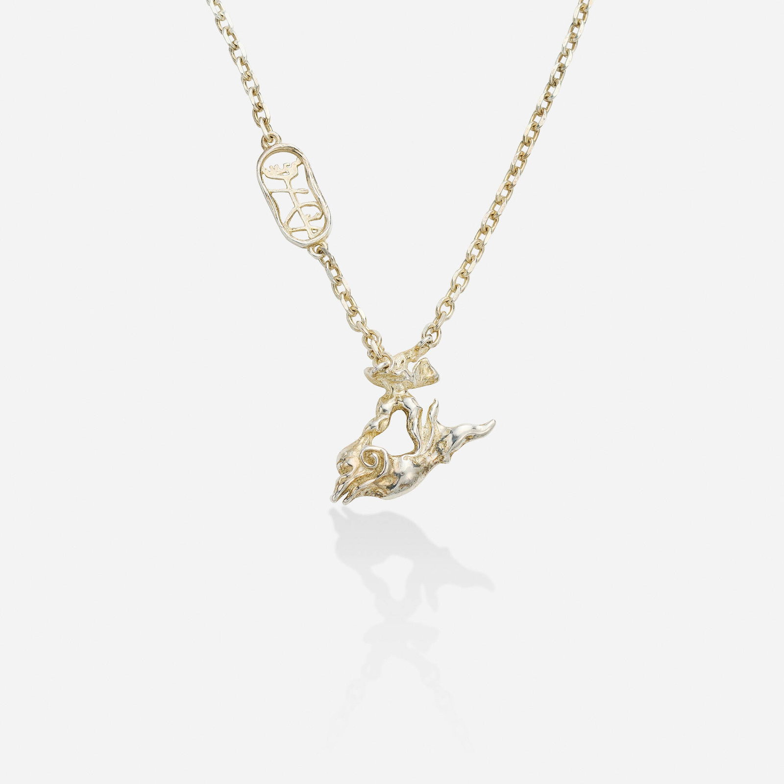 Salvador Dali, 'Hombre Sobre Delfin' sterling silver necklace: Salvador Dali 'Hombre Sobre Delfin' sterling silver necklace The 'Hombre Sobre Delfin' abstract figure, suspended from the fancy link chain Sterling silver Signed Dali, numbered Necklace