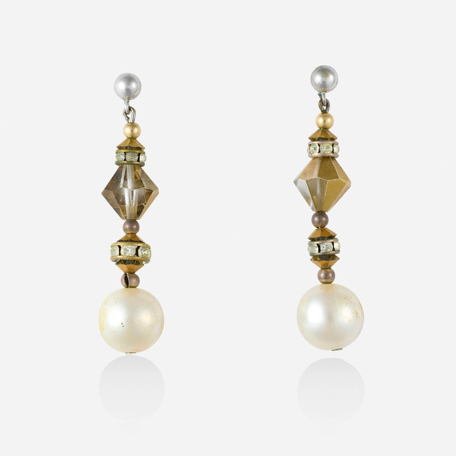 Costume earrings: Costume earrings Each set with plastic beads and a faux pearl Base metal 1.875 x 0.375 in; Gross weight 4.6 dwts Provenance: Collection of Mari Shaw This work will ship from Lambertvil