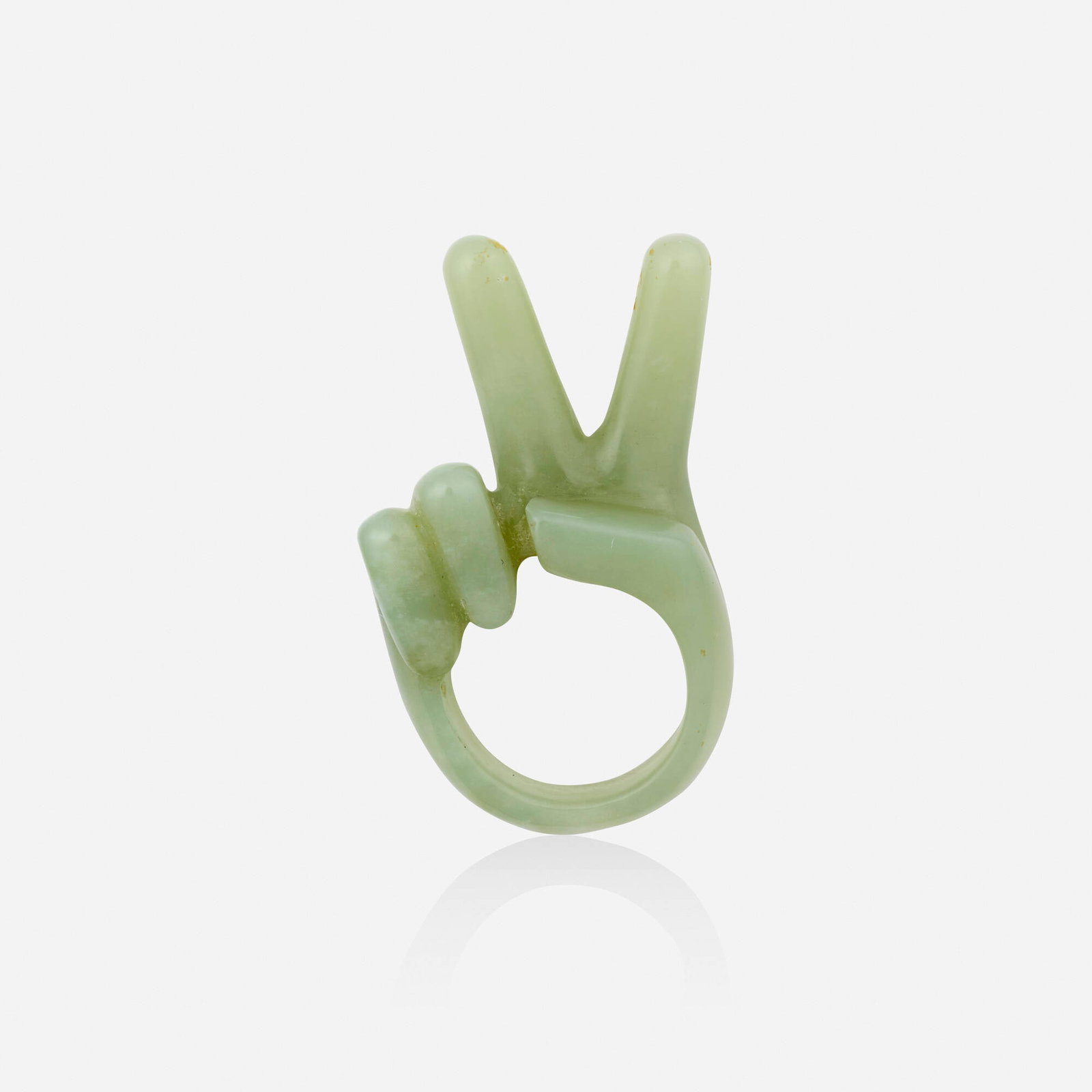 Gijs Bakker, 'Peace' nephrite jade ring: Gijs Bakker 'Peace' nephrite jade ring Depicting a carved nephrite jade hand making the 'Peace' sign Ring size approx. 6; Gross weight 8.4 dwts Provenance: Collection of Mari Sh