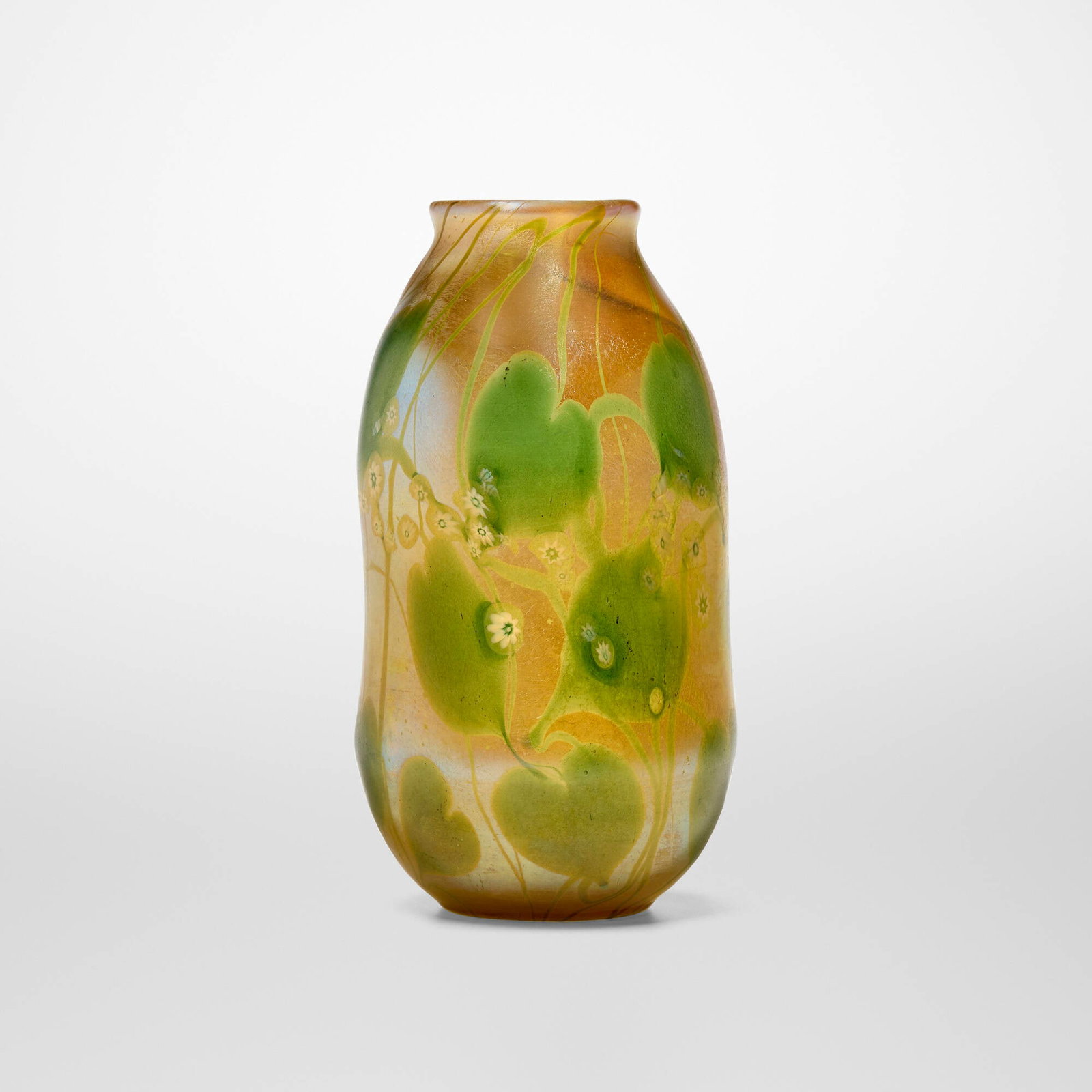 Tiffany Studios, Millefiori Leaf and Vine vase: Tiffany Studios Millefiori Leaf and Vine vase USA, c. 1900-1903 hand-blown Favrile glass 7.5 h x 4 dia in (19 x 10 cm) Vase features more than seventy millefiori inlaid flowers throughout. Etched to