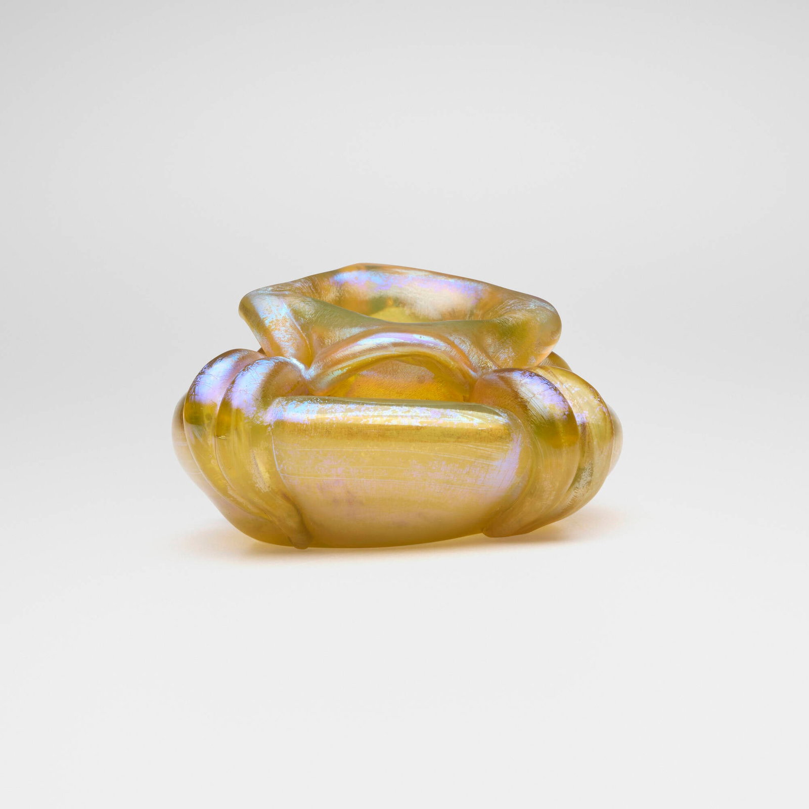 Tiffany Studios, Early cabinet vase: Tiffany Studios Early cabinet vase USA, c. 1895-1896 hand-blown Favrile glass 2 h x 4.25 dia in (5 x 11 cm) Etched to underside 'L.C.T. D2640'. This work will ship from Lambertville, New