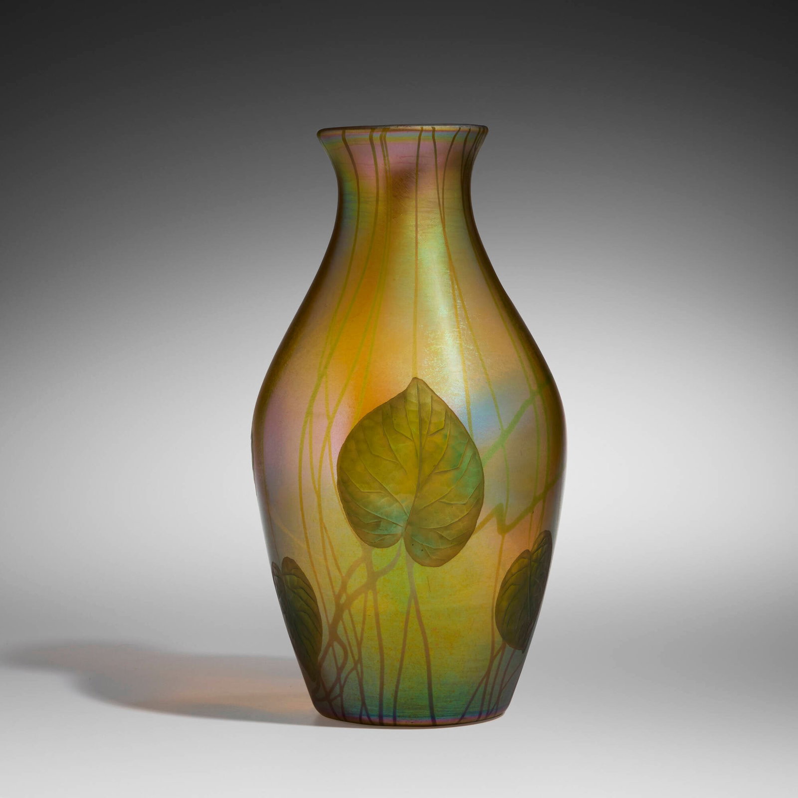 Tiffany Studios, Large Leaf and Vine vase: Tiffany Studios Large Leaf and Vine vase USA, c. 1914-1915 hand-blown and wheel-carved Favrile glass 12 h x 6.375 dia in (30 x 16 cm) Etched to underside '6759K L.C. Tiffany - Favrile'.