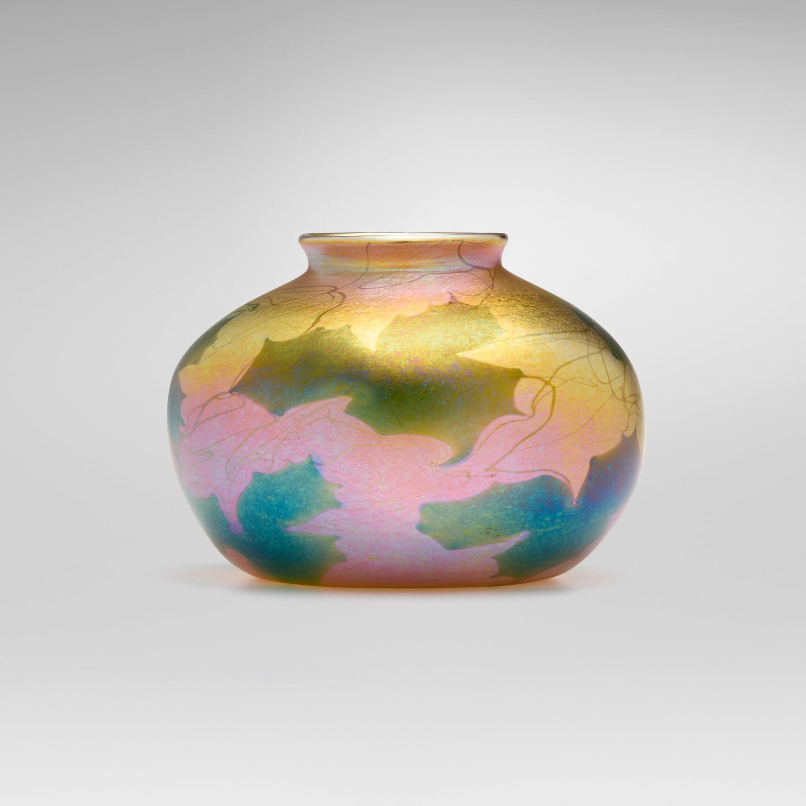 Tiffany Studios, Leaf and Vine vase: Tiffany Studios Leaf and Vine vase USA, c. 1904-1906 hand-blown Favrile glass 4.625 h x 6.5 dia in (12 x 17 cm) Etched to underside 'L.C. Tiffany - Favrile 2977C' with paper