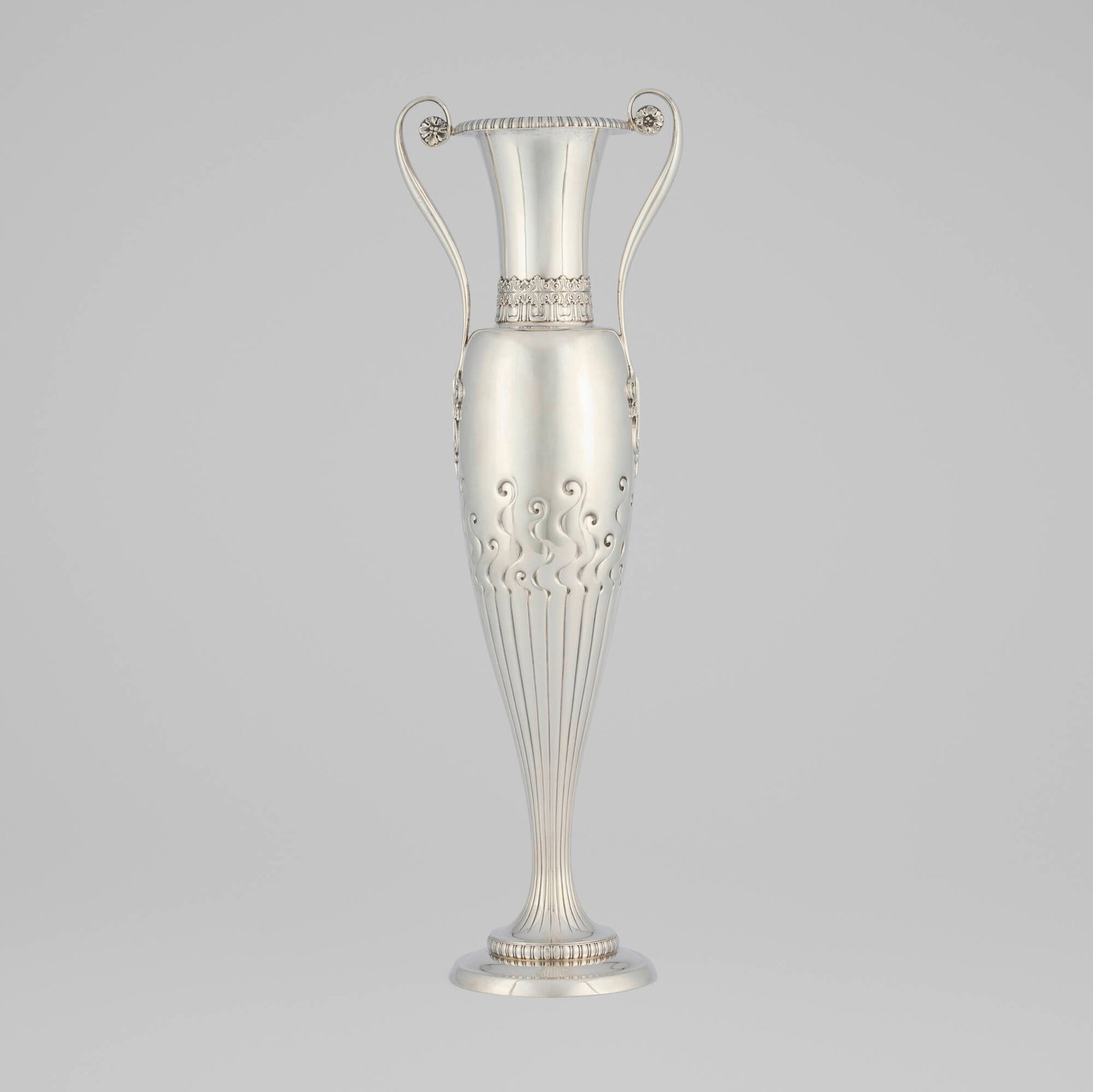Tiffany & Co., Tall vase with scrolling tendrils: Tiffany & Co. Tall vase with scrolling tendrils New York, USA, 1892-1902 sterling silver 17.75 h x 5.75 w x 4.25 d in (45 x 15 x 11 cm) The present work was made under the artistic direction of