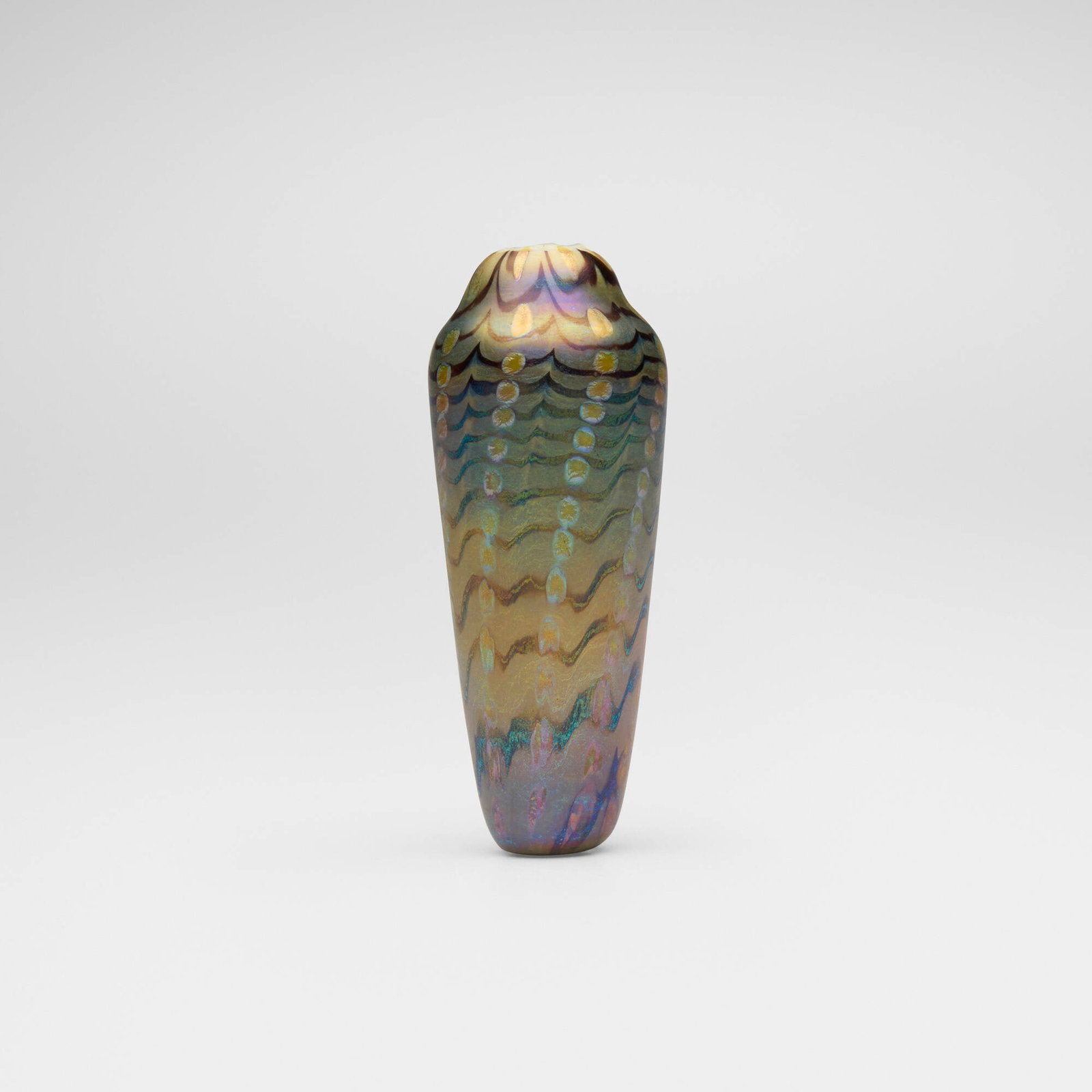 Tiffany Studios, Early decorated perfume sample bottle: Tiffany Studios Early decorated perfume sample bottle USA, c. 1895-1896 hand-blown Favrile glass 3.5 h x 1.25 dia in (9 x 3 cm) Etched to underside 'L.C.T. B939'. This work will ship from
