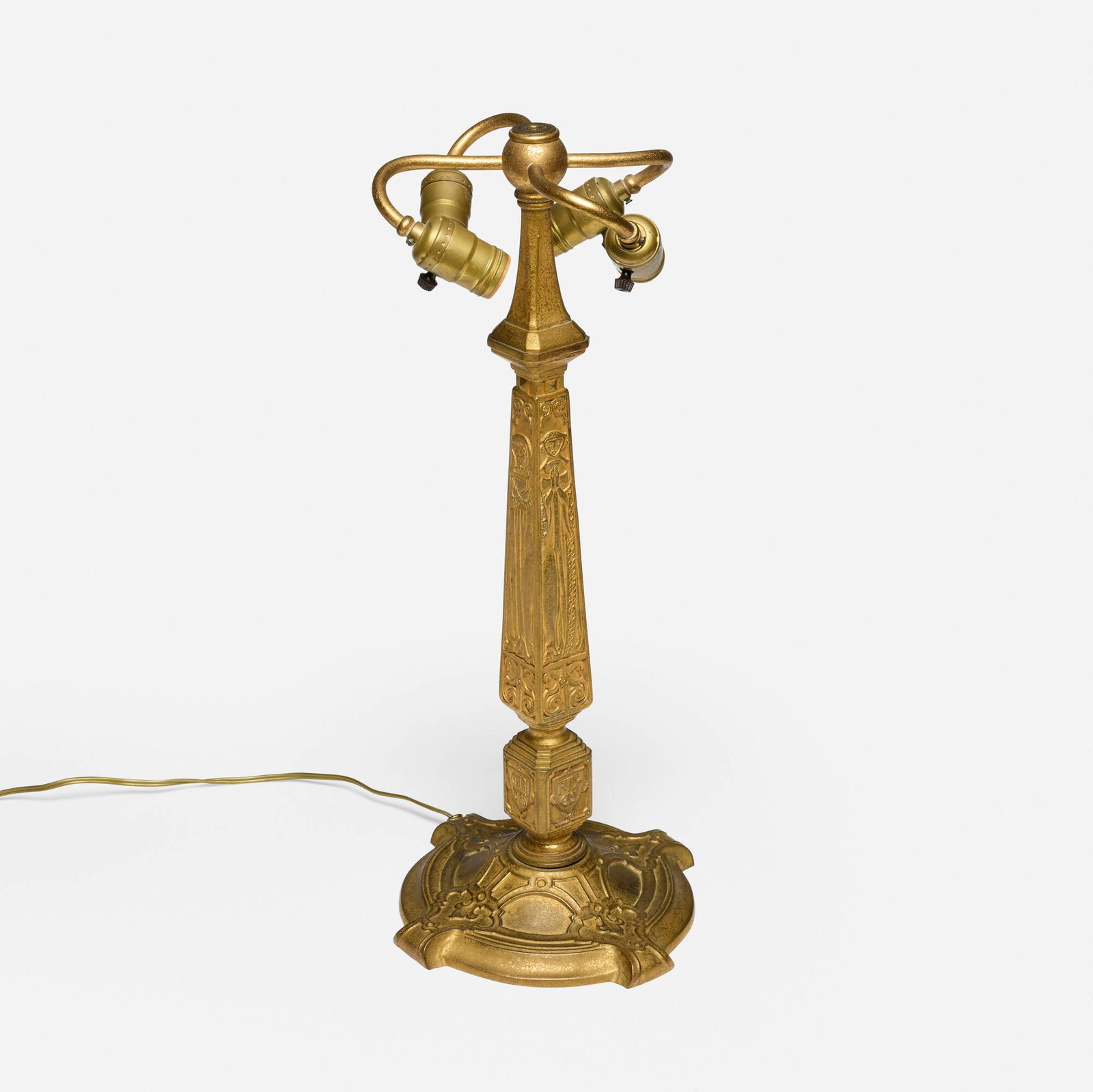 Tiffany Studios, Old English (Four Virtues) lamp base: Tiffany Studios Old English (Four Virtues) lamp base USA, c. 1910 acid-etched and gilt bronze 22.5 h x 8.5 dia in (57 x 22 cm) Impressed to underside 'TIFFANY STUDIOS NEW YORK 557'.