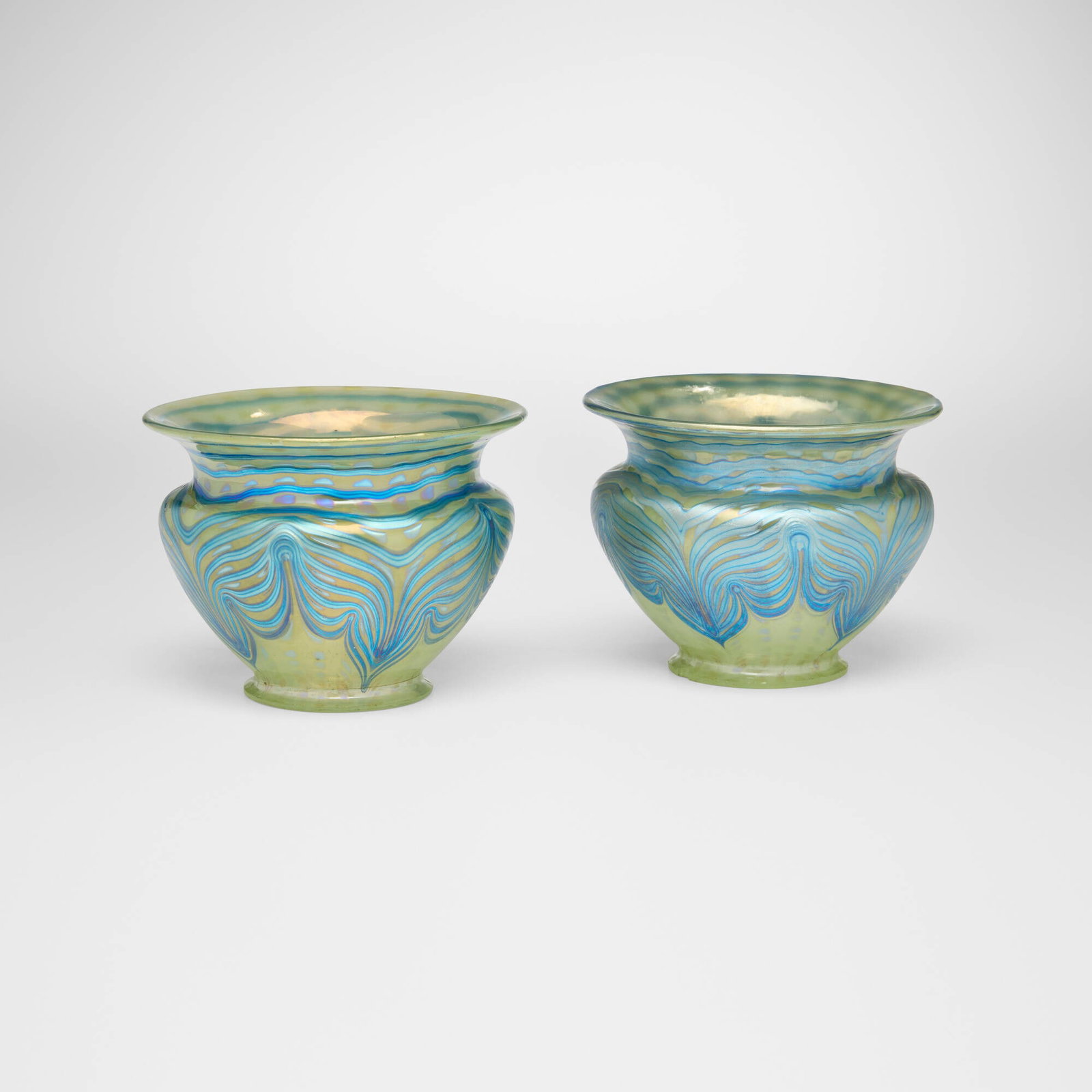 Loetz, Phanomen shades (Gre 2/187), pair: Loetz Phanomen shades (Gre 2/187), pair Austria, c. 1902 hand-blown glass 3.5 h x 4.5 dia in (9 x 11 cm) Literature: Loetz Bohemian Glass 1880-1940, Mergl, Ploil, and