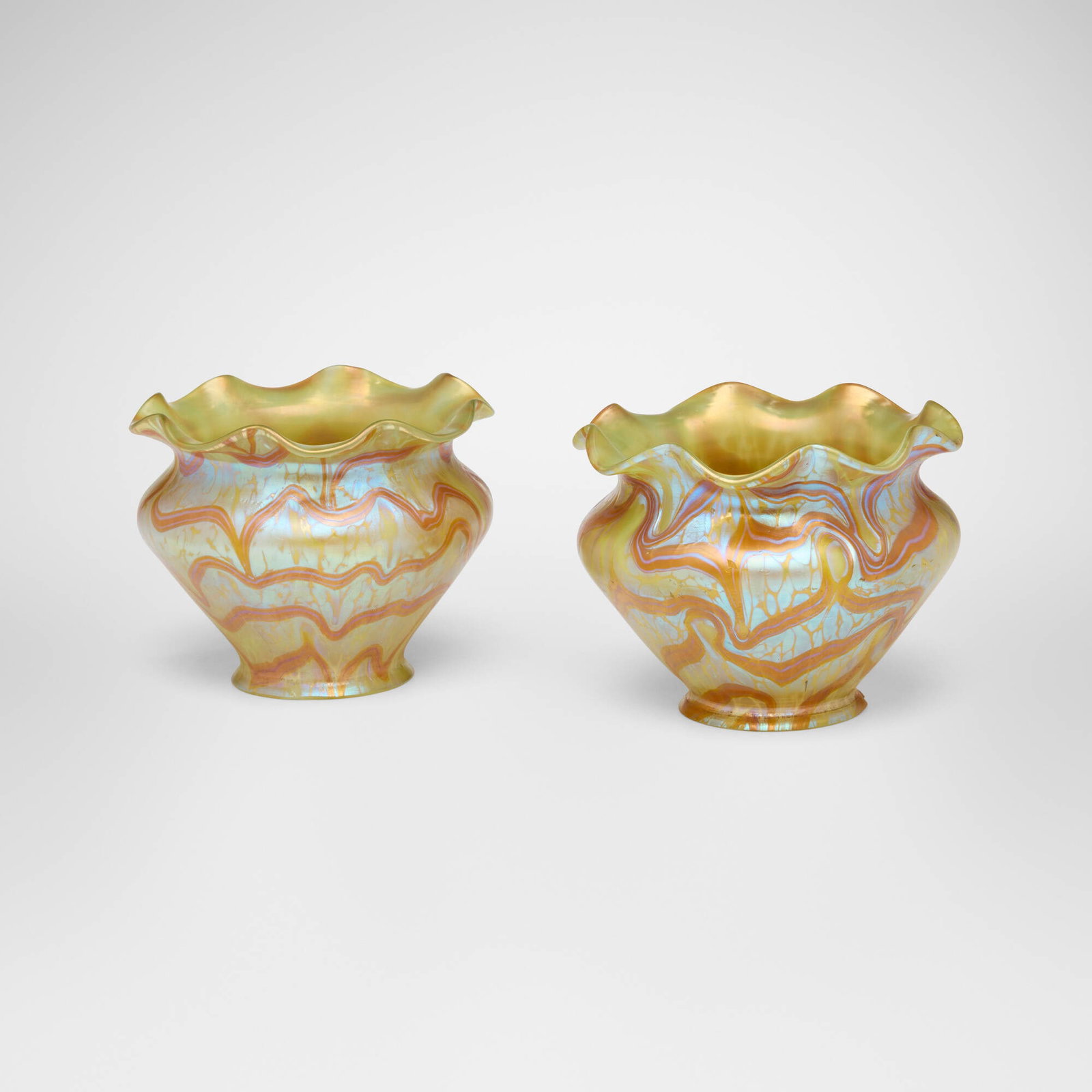 Loetz, Phanomen shades (Gre 1/104), pair: Loetz Phanomen shades (Gre 1/104), pair Austria, c. 1901 hand-blown glass 3.5 h x 4.5 dia in (9 x 11 cm) Literature: Loetz Bohemian Glass 1880-1940, Mergl, Ploil, and