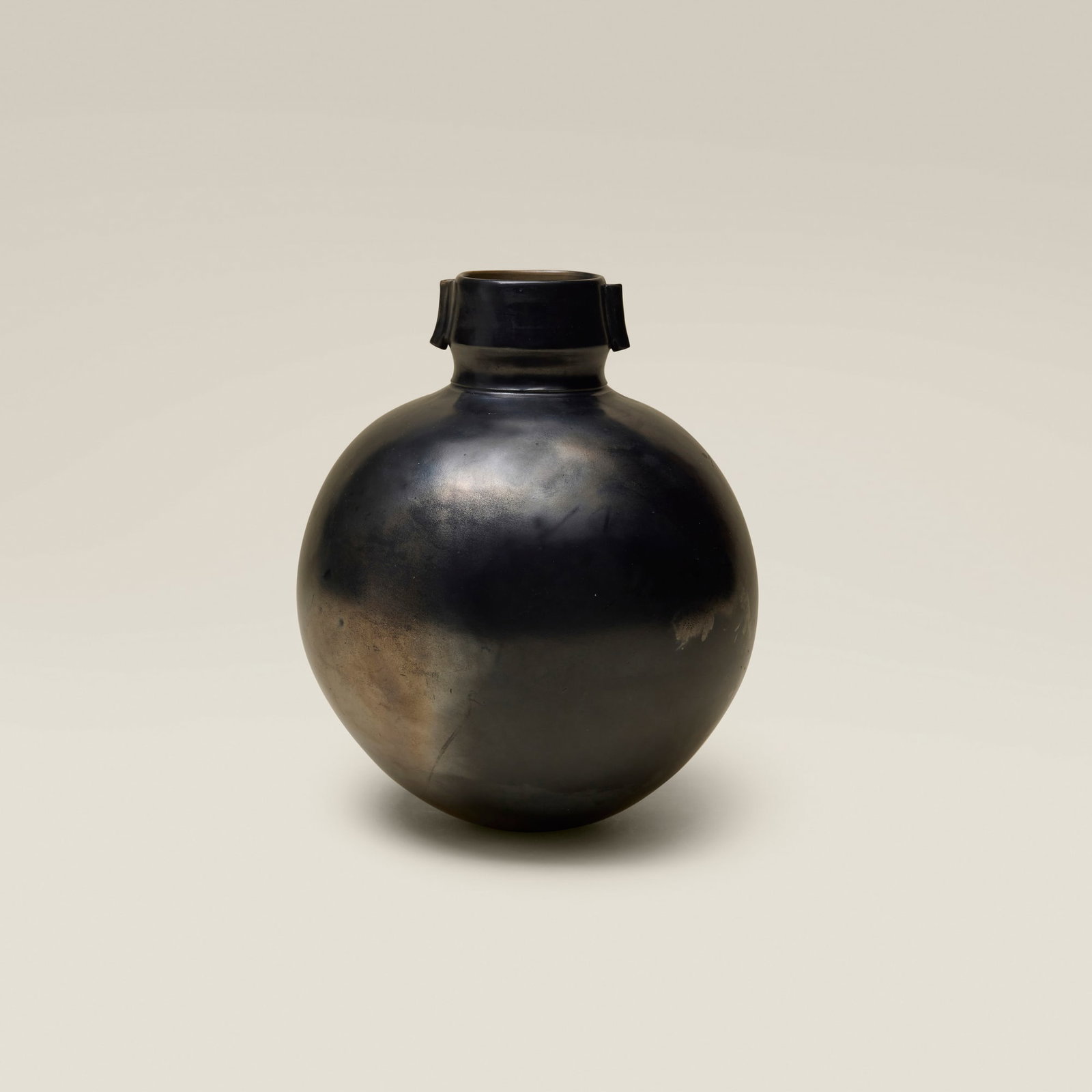 Magdalene Odundo, Untitled (Vessel): Magdalene Odundo Untitled (Vessel) 1983 burnished and carbonised terracotta 9.25 h x 7.75 dia in (23 x 20 cm) Incised signature to underside 'Odundo'. Provenance: Gift from Morton and Dena