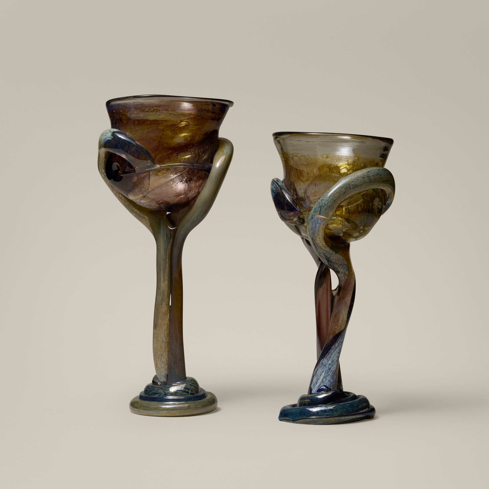 Dale Chihuly, Early goblets, set of two: Dale Chihuly Early goblets, set of two c. 1972 hand-blown glass 12.25 h x 5.625 w x 4.375 d in (31 x 14 x 11 cm) 10.75 h x 5.125 w x 4.625 d in (27 x 13 x 12 cm) Provenance: Collection of Jack Lenor
