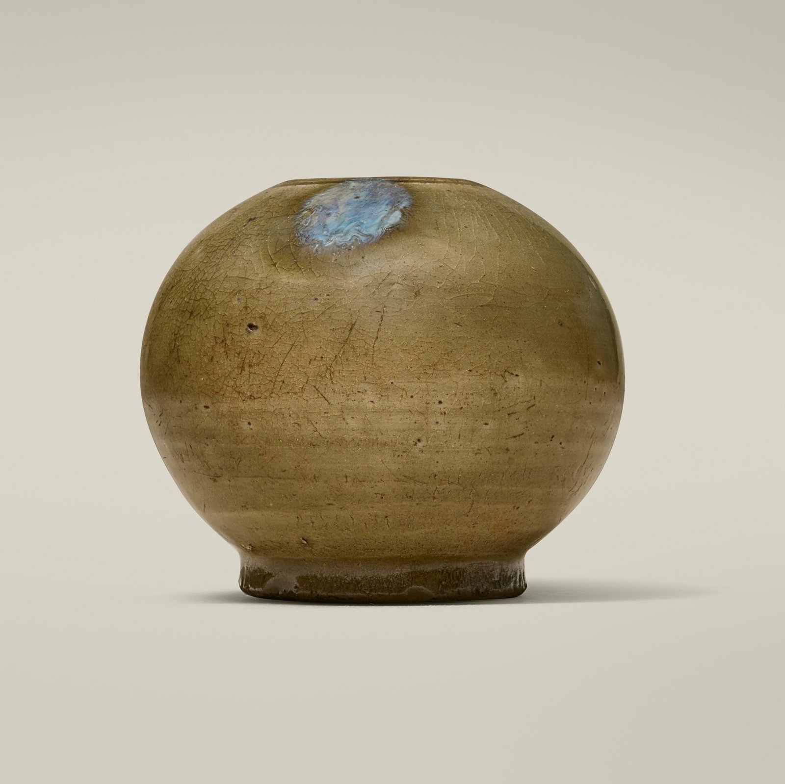 Chinese, Yue ware jar: Chinese Yue ware jar 19th century or earlier glazed stoneware 3.5 h x 4 dia in (9 x 10 cm) Provenance: Collection of Jack Lenor Larsen This work will ship from Lambertville, New Jersey.
