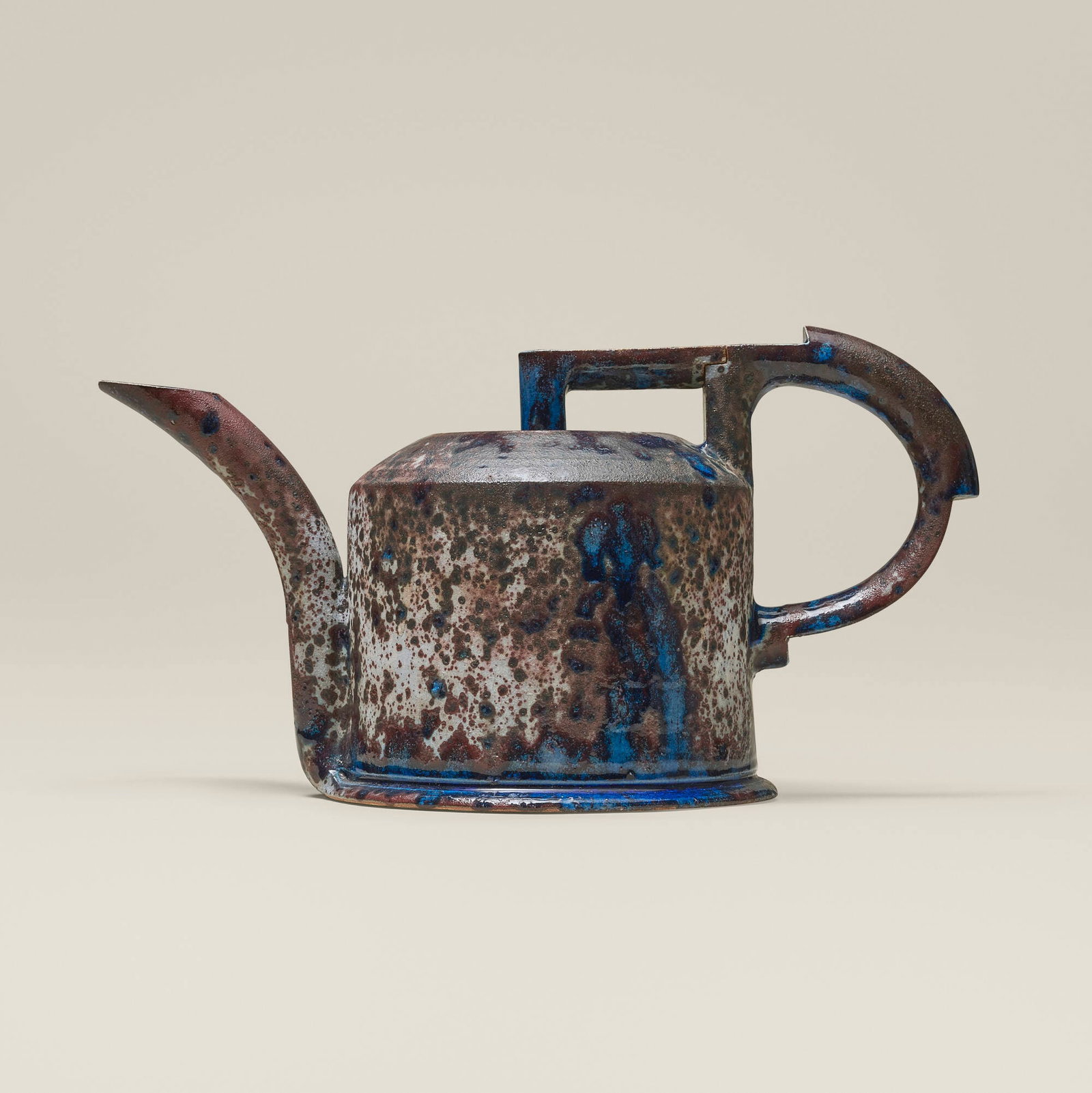 Anne Hirondelle, Teapot: Anne Hirondelle Teapot c. 1985 glazed stoneware 8 h x 14.75 w x 7.625 d in (20 x 37 x 19 cm) Slip signature to underside 'A.E. Hirondelle'. Provenance: American Craft Council Auction |