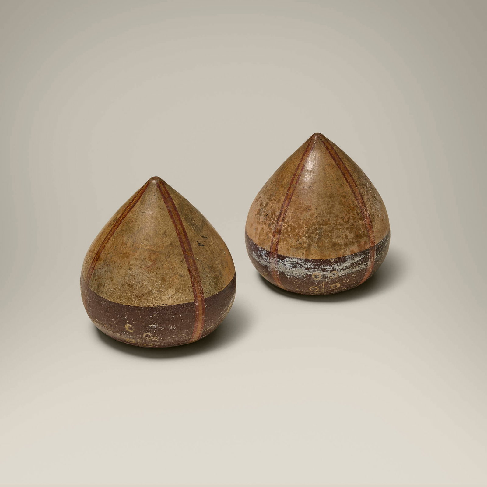 Nasca, Tear-shaped bowls, set of two: Nasca Tear-shaped bowls, set of two Peru slip-glazed and burnished earthenware 5 h x 4.5 dia in (13 x 11 cm) A similar example is held in the permanent collection of the Metropolitan Museum of Art,