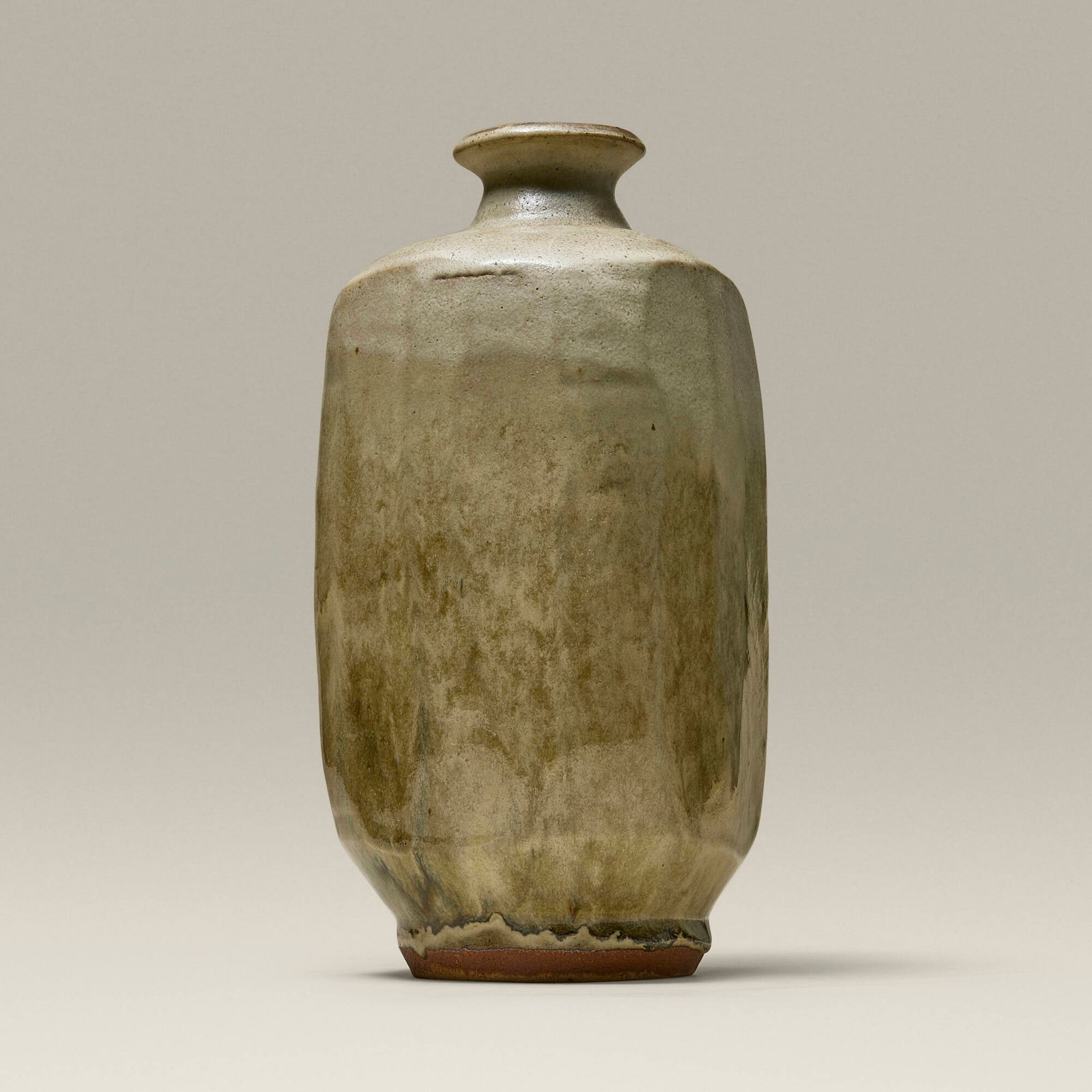 Shoji Hamada, Faceted bottle: Shoji Hamada Faceted bottle c. 1960 glazed stoneware 11.875 h x 6 w x 6 d in (30 x 15 x 15 cm) Provenance: Collection of Jack Lenor Larsen Literature: Hamada Potter, Leach, plates 2, 4 and 6