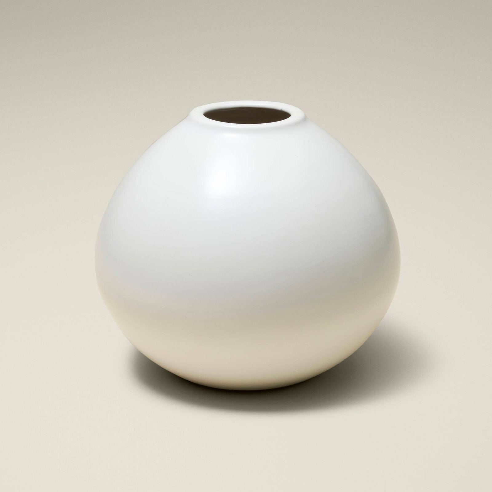 Korean, Globular jar: Korean Globular jar second half of the 20th century glazed stoneware 7.5 h x 8.75 dia in (19 x 22 cm) Impressed seal to underside. Provenance: Collection of Jack Lenor Larsen This work will ship from