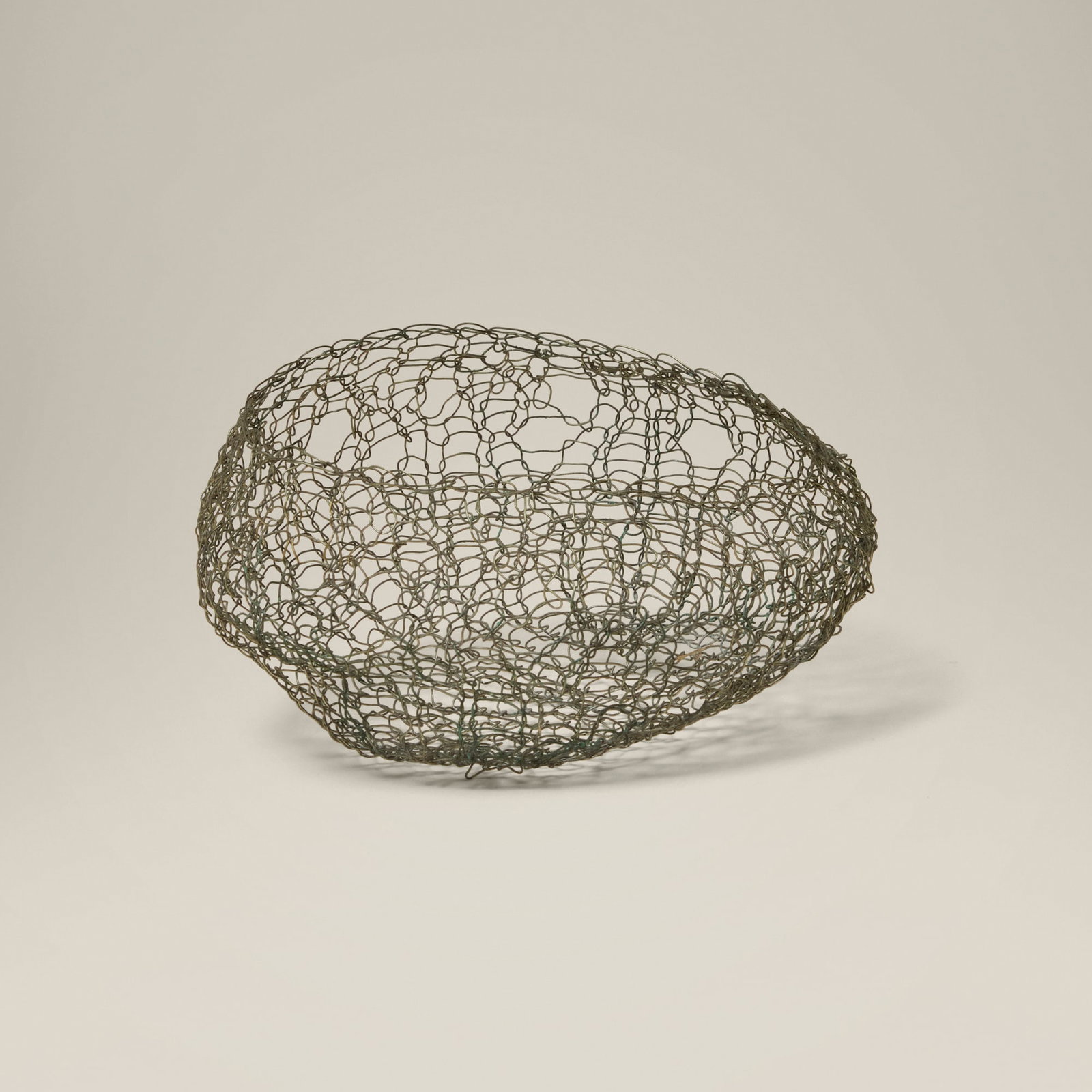 Modern, Wire construction: Modern Wire construction late 20th century plated copper wire 2.5 h x 5.5 w x 5 d in (6 x 14 x 13 cm) Provenance: Collection of Jack Lenor Larsen This work will ship from Lambertville, New Jersey.