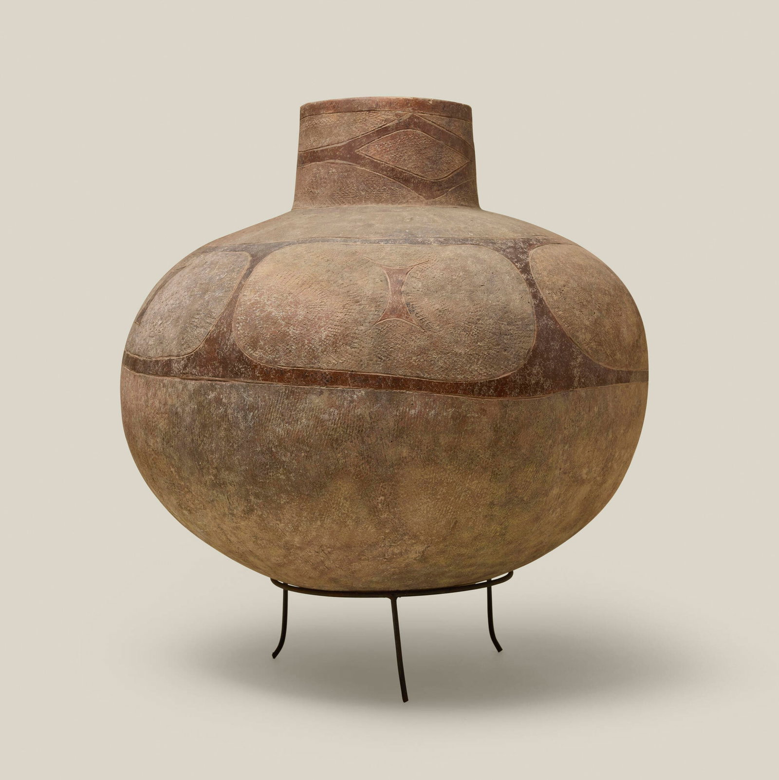 African, Vessel: African Vessel slip-glazed, burnished, and incised earthenware 18.5 h x 20.5 dia in (47 x 52 cm) Provenance: Collection of Jack Lenor Larsen This work will ship from Lambertville, New Jersey.